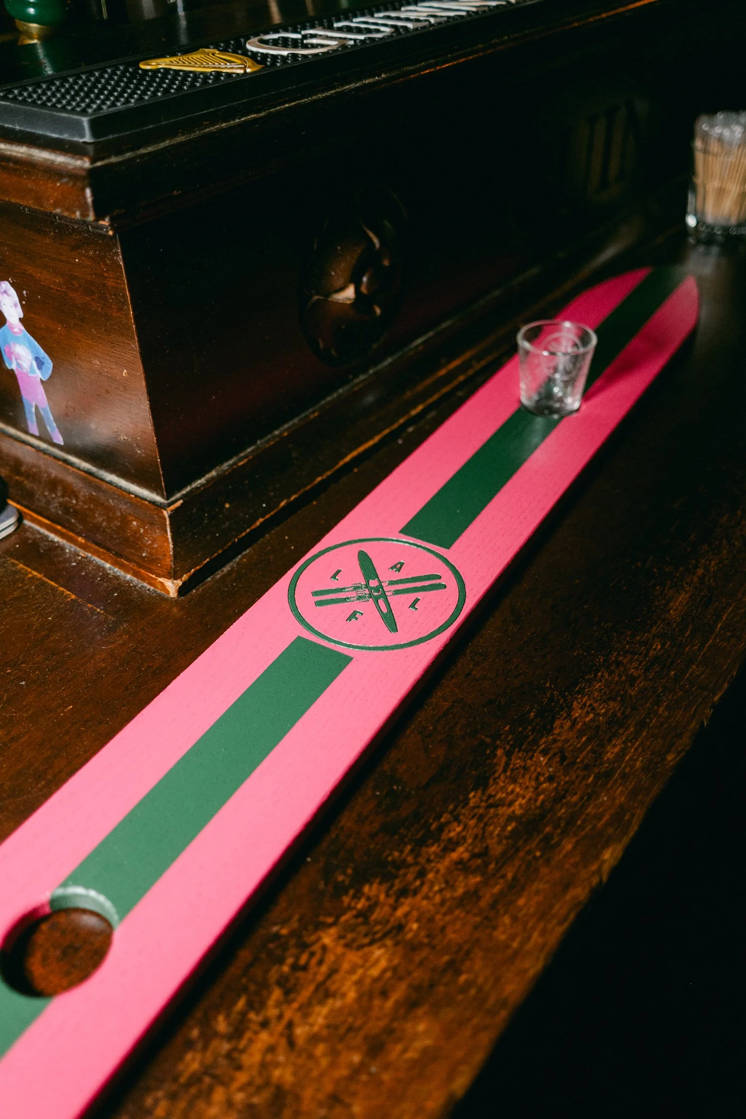 Palisades wedding venue, photo of pink and green wooden shot ski themed