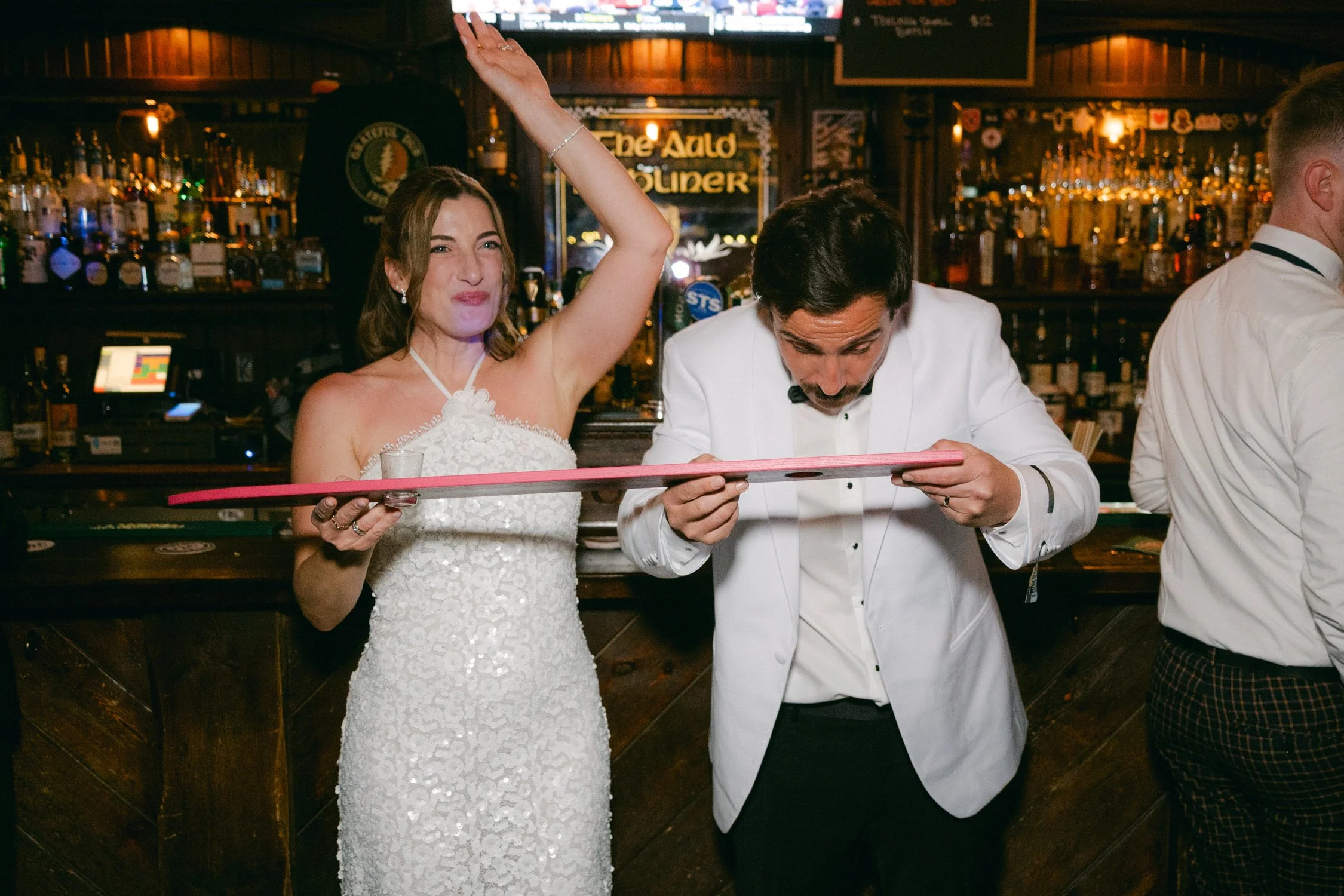Palisades wedding venue, photo of the newlyweds taking shots at an Irish pub