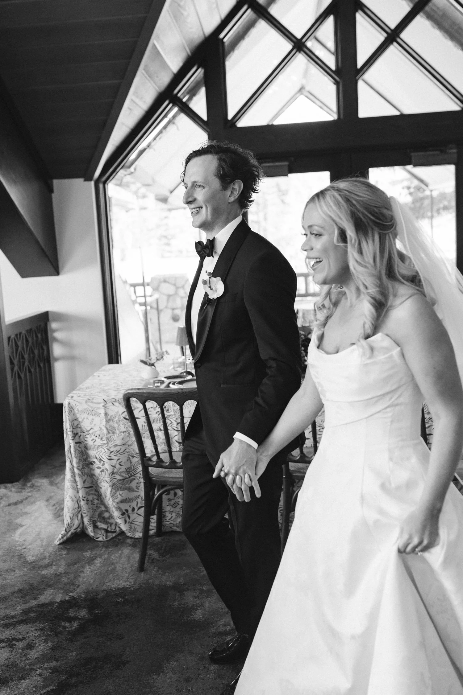 Edgewood maximalist wedding, photo of the bride and groom entering the reception venue