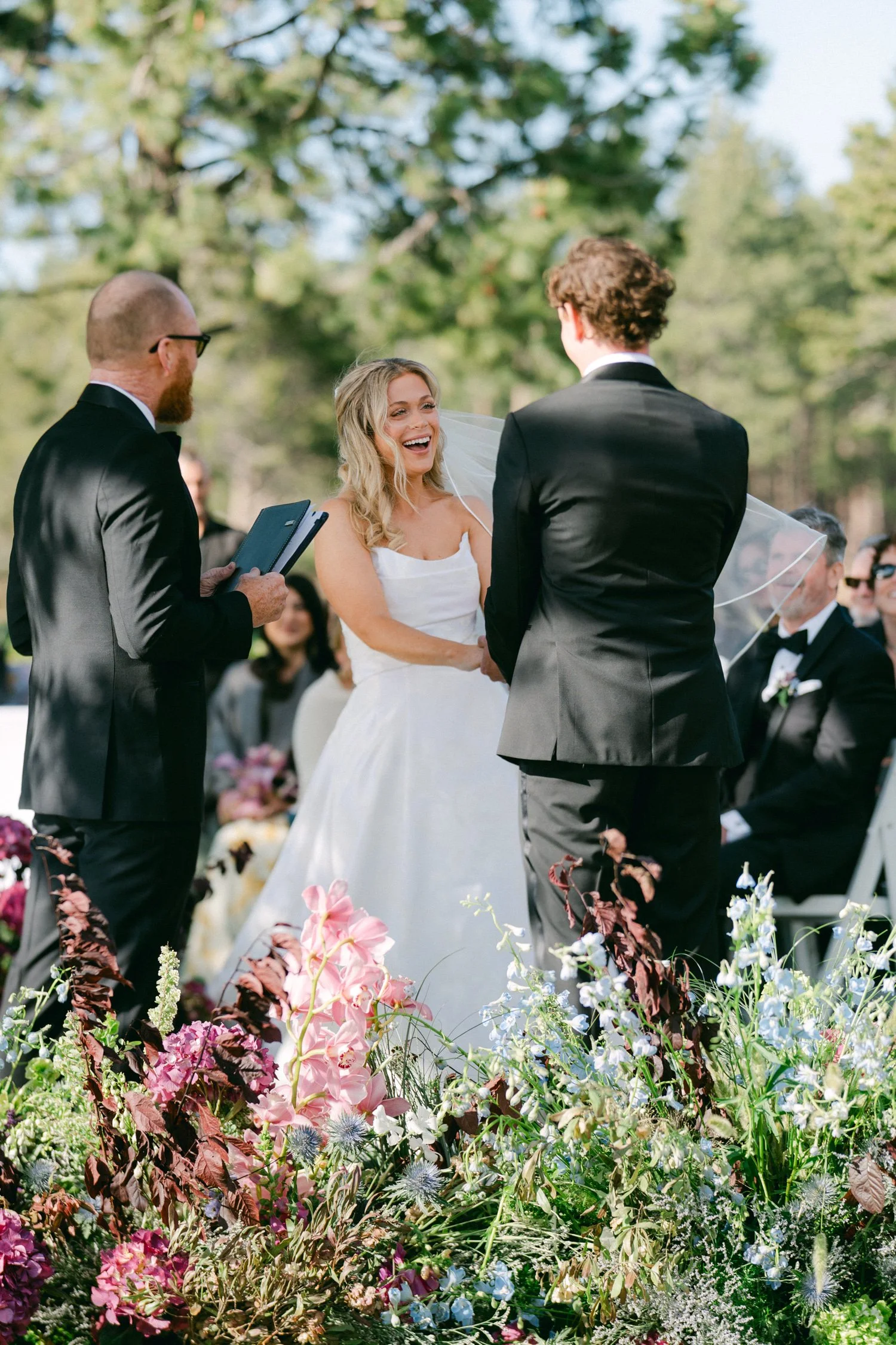 Edgewood maximalist wedding, photo of the bride and groom during an outdoor wedding ceremony