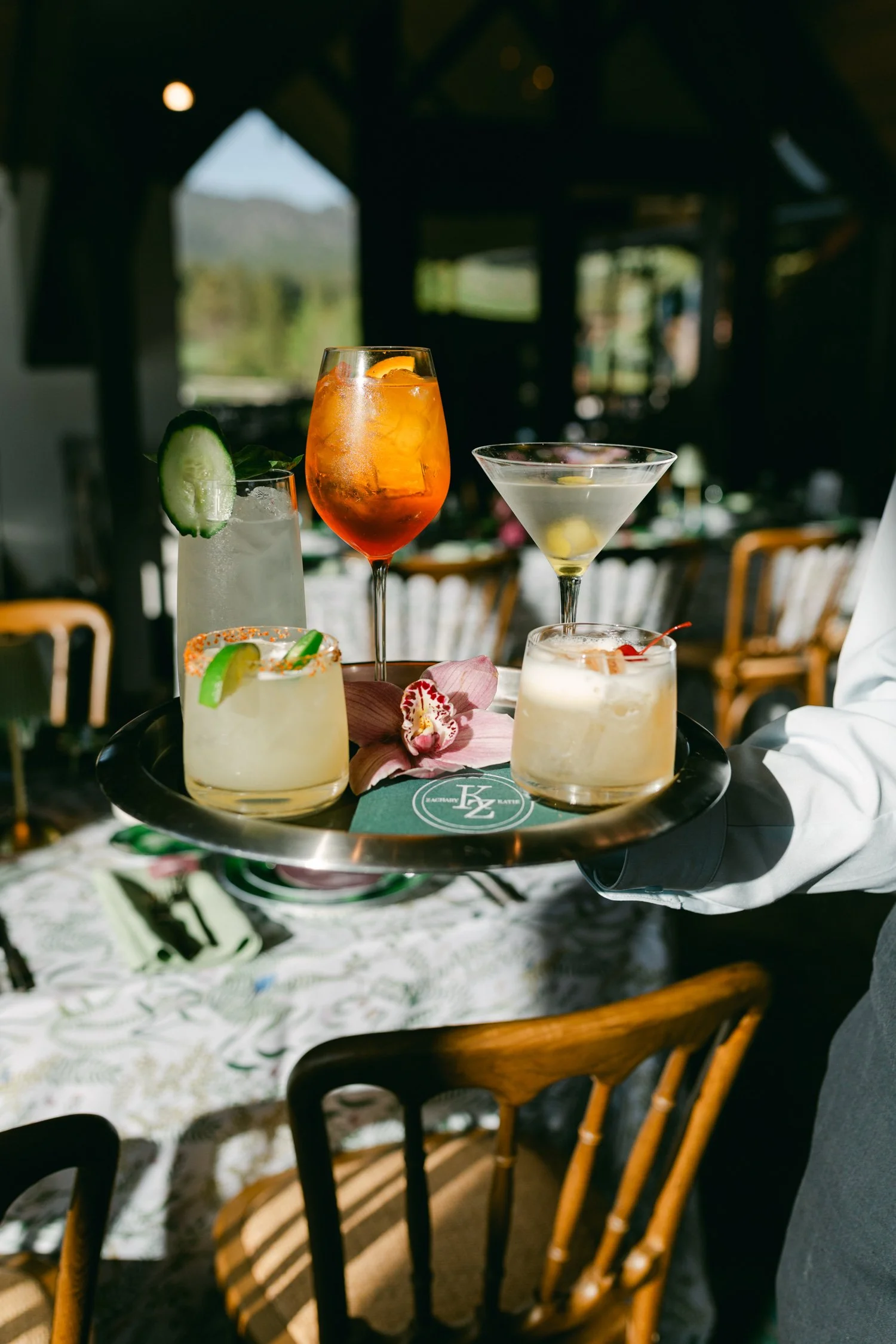 Edgewood maximalist wedding, photo of a curated tray of cocktails served during reception