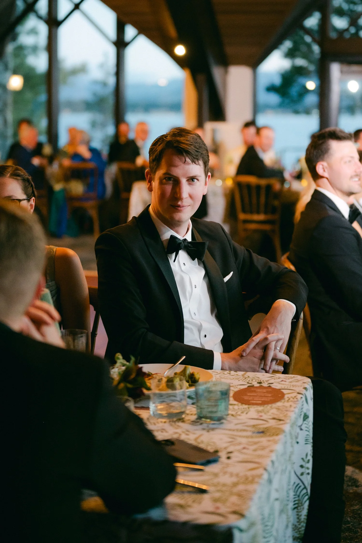 Edgewood maximalist wedding, photo of a guest wearing a classic black tuxedo jacket for the wedding reception