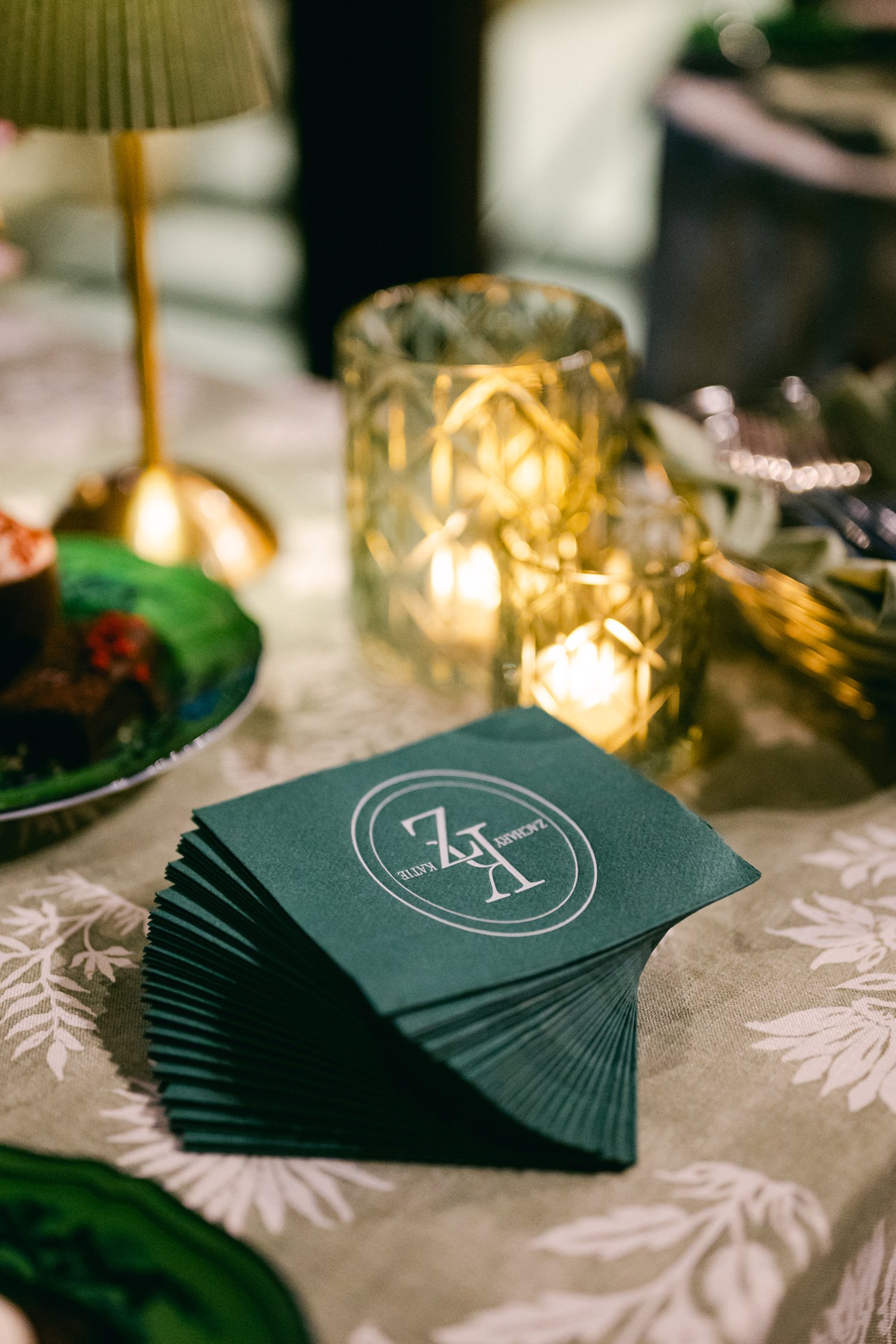 Edgewood maximalist wedding, photo of personalized green cocktail napkins with white letter font