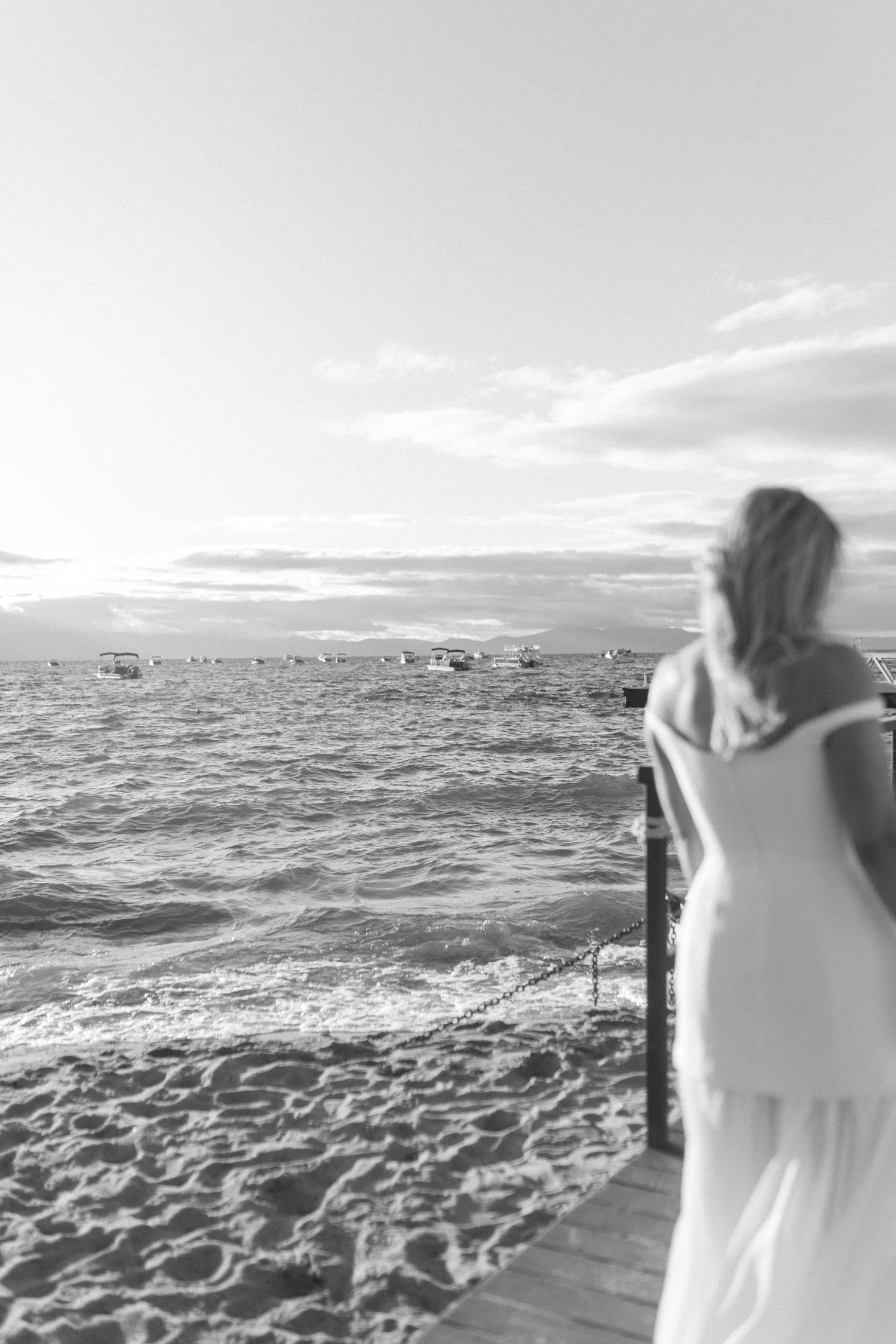 Riva Grill welcome party, photo of the bride walking in a modern white dress