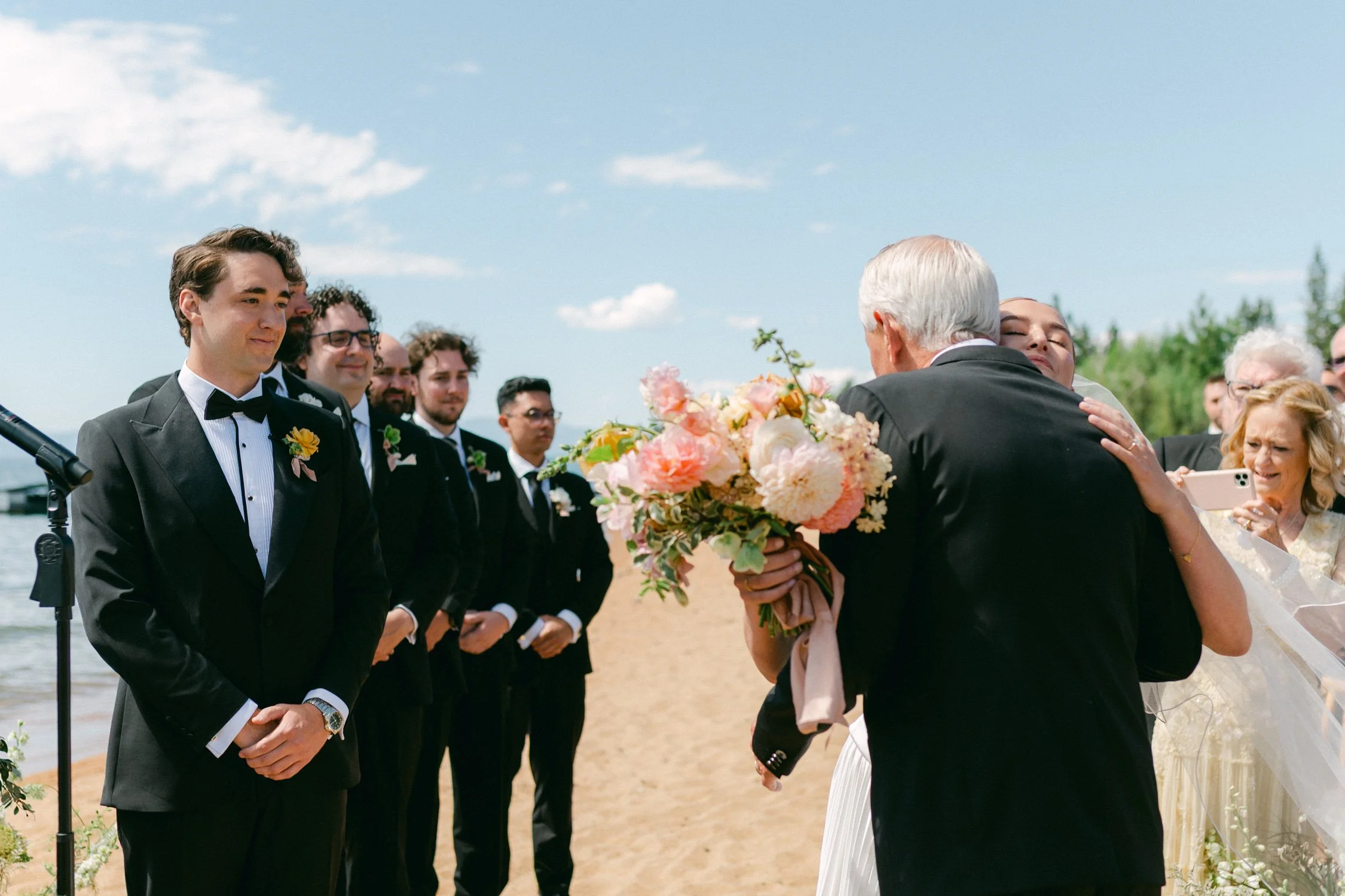 Lake Tahoe 4-H Camp wedding photos, photo of a romantic beach wedding ceremony