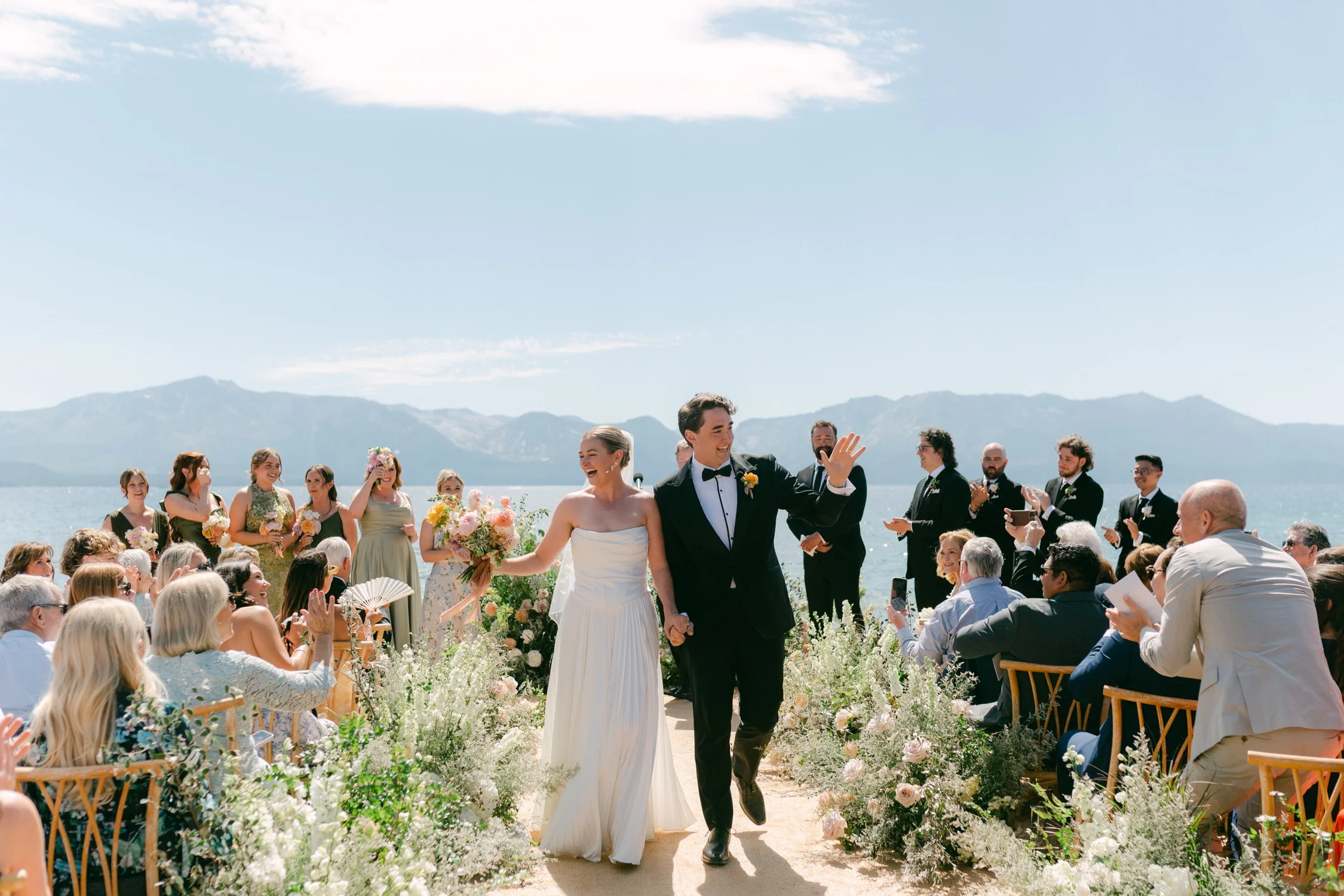 Lake Tahoe 4-H Camp wedding photos, photo of an outdoor wedding ceremony set against a scenic backdrop of mountains and Lake Tahoe