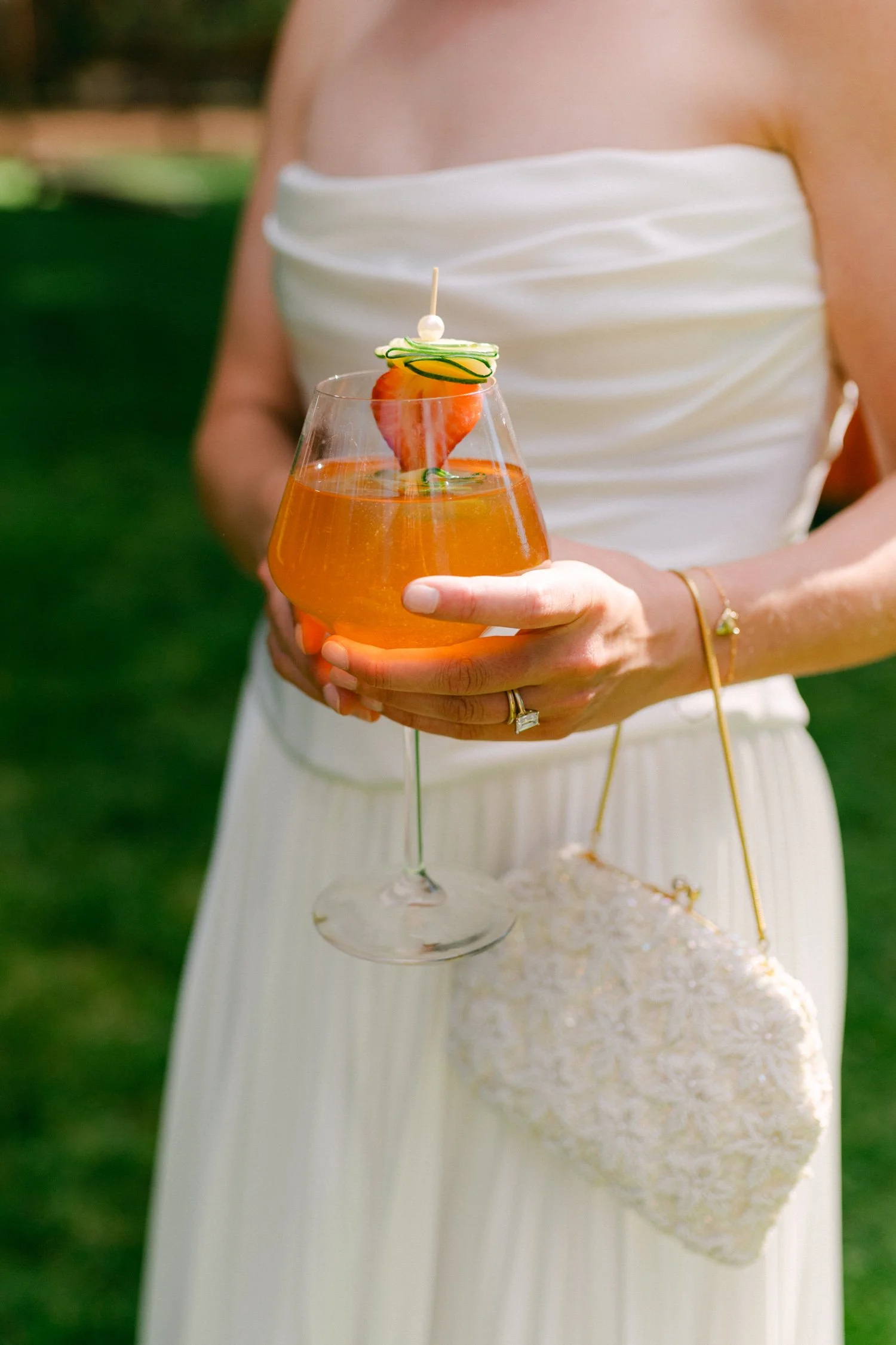 Lake Tahoe 4-H Camp wedding photos, photo of the bride enjoying her aperol spritz