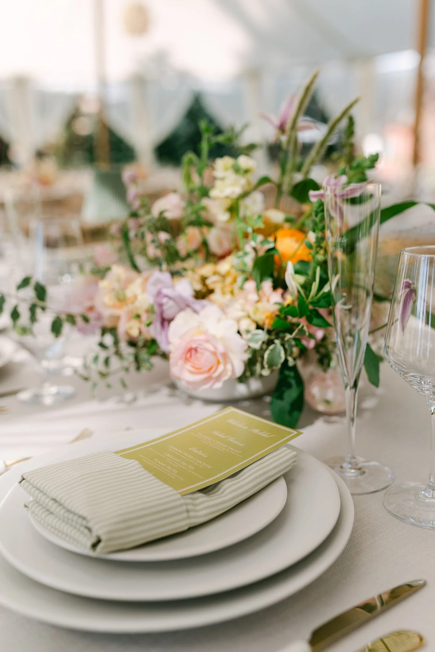 Lake Tahoe 4-H Camp wedding photos, photo of table setting with stripe linen and floral arrangements 