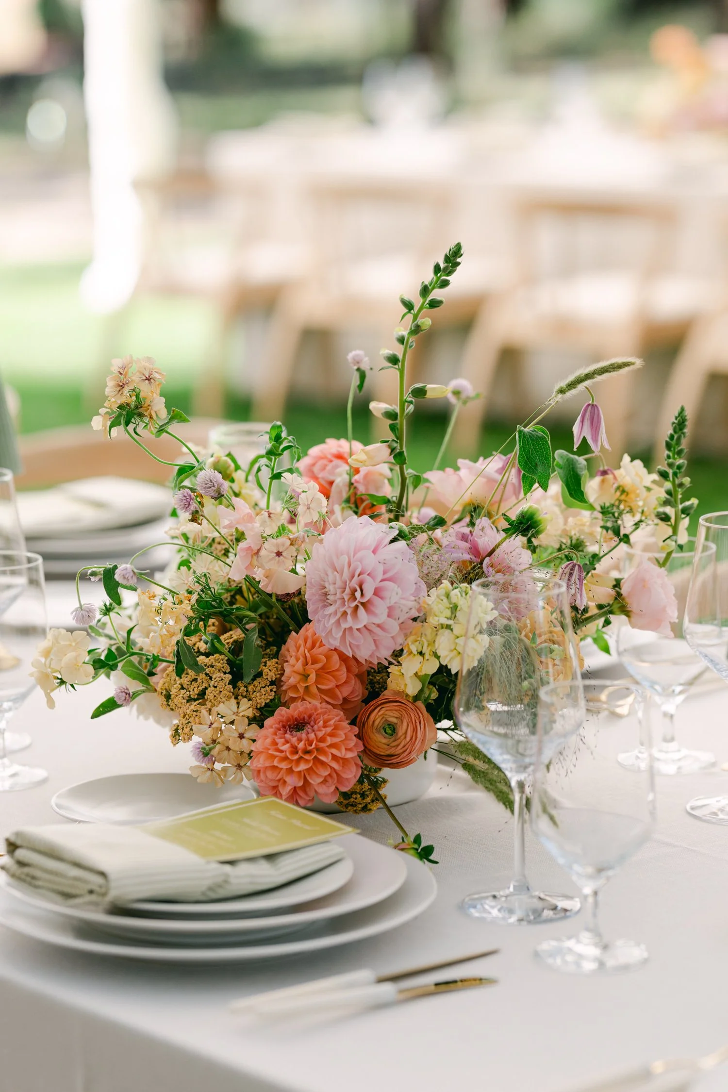 Lake Tahoe 4-H Camp wedding photos, photo of vibrant floral centerpiece for an outdoor wedding reception