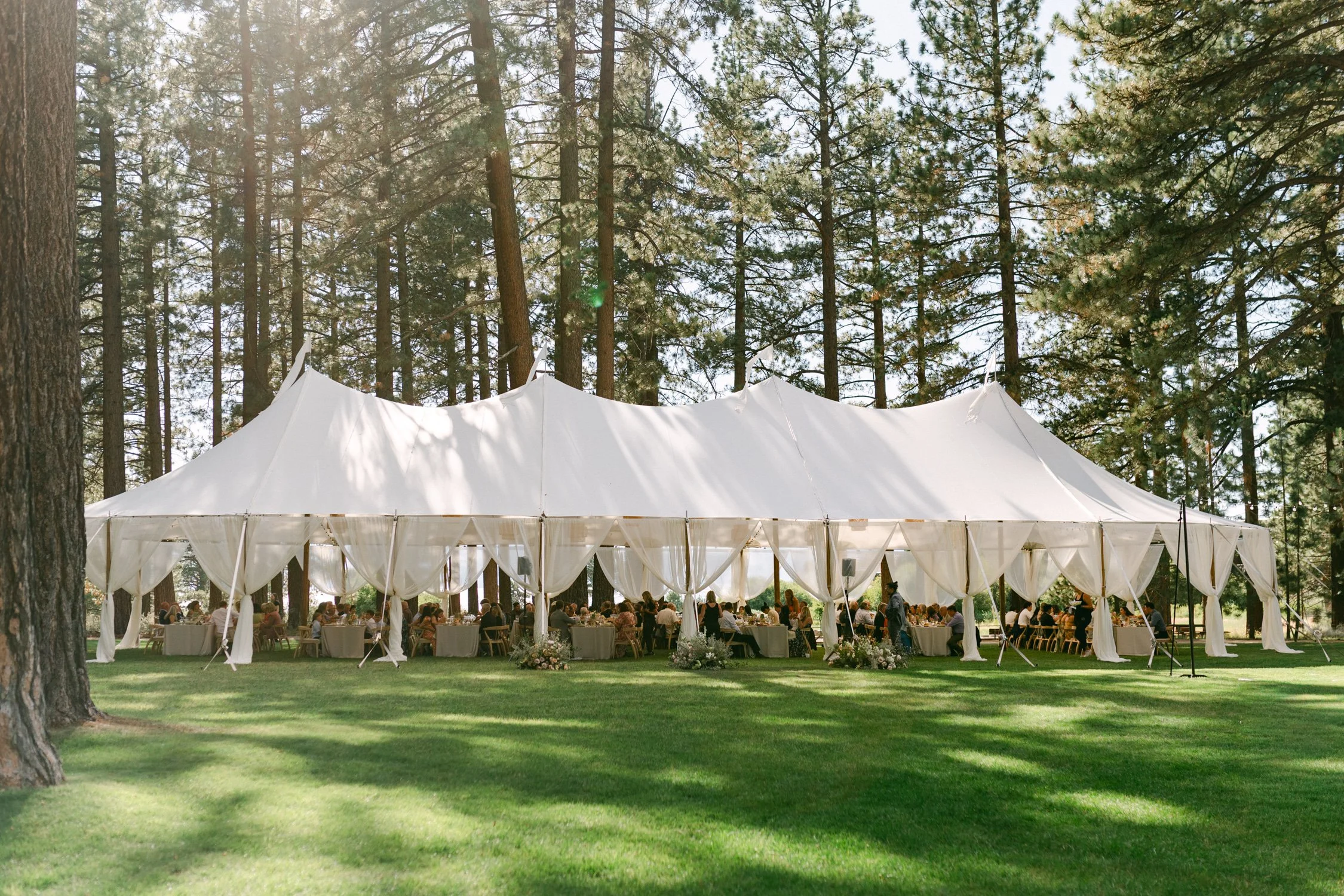 Lake Tahoe 4-H Camp wedding photos, photo of a wedding tent in a classic marquee style, often used for outdoor garden weddings and receptions.