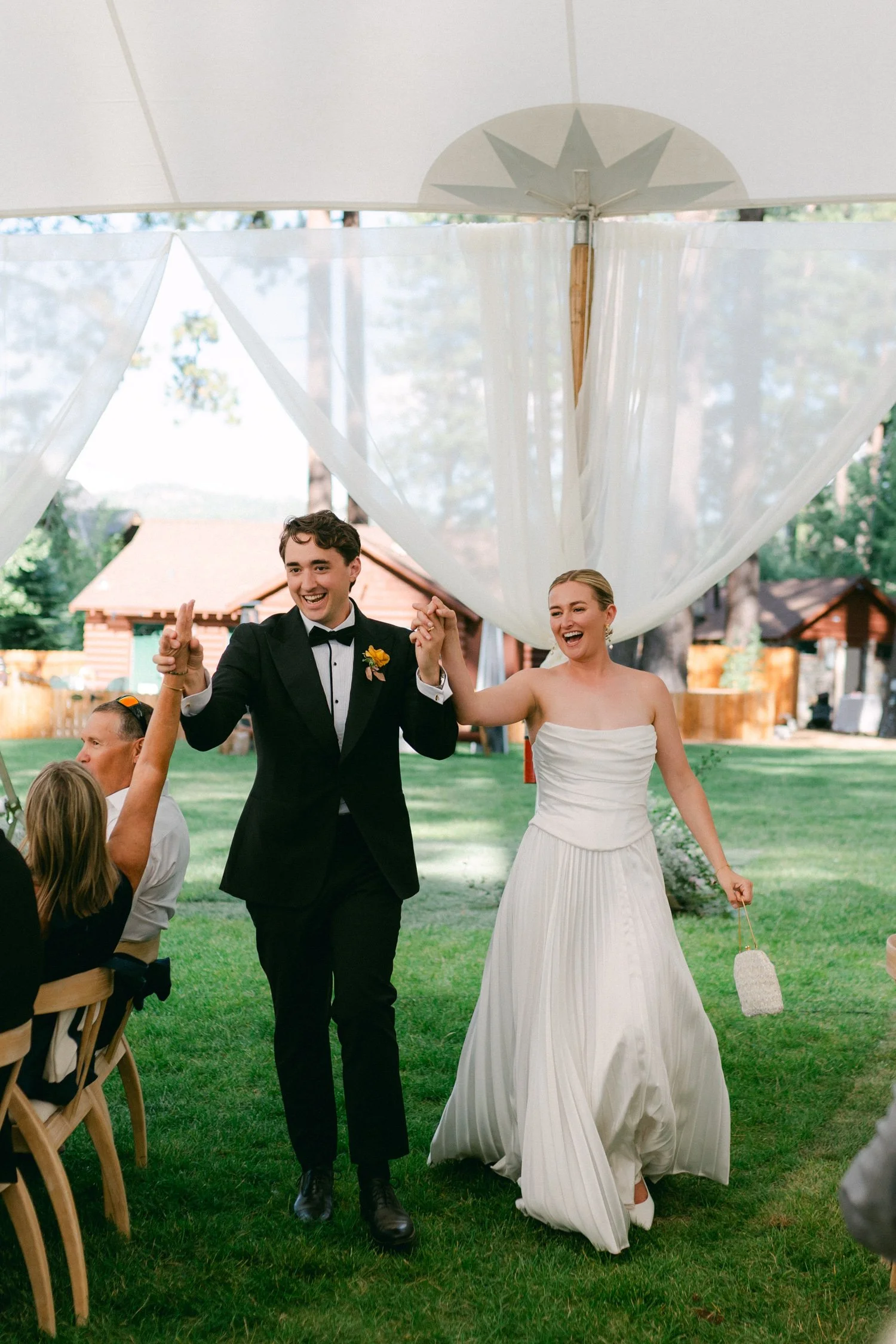Lake Tahoe 4-H Camp wedding photos, photo of the newlywed couple's grand entrance at their reception