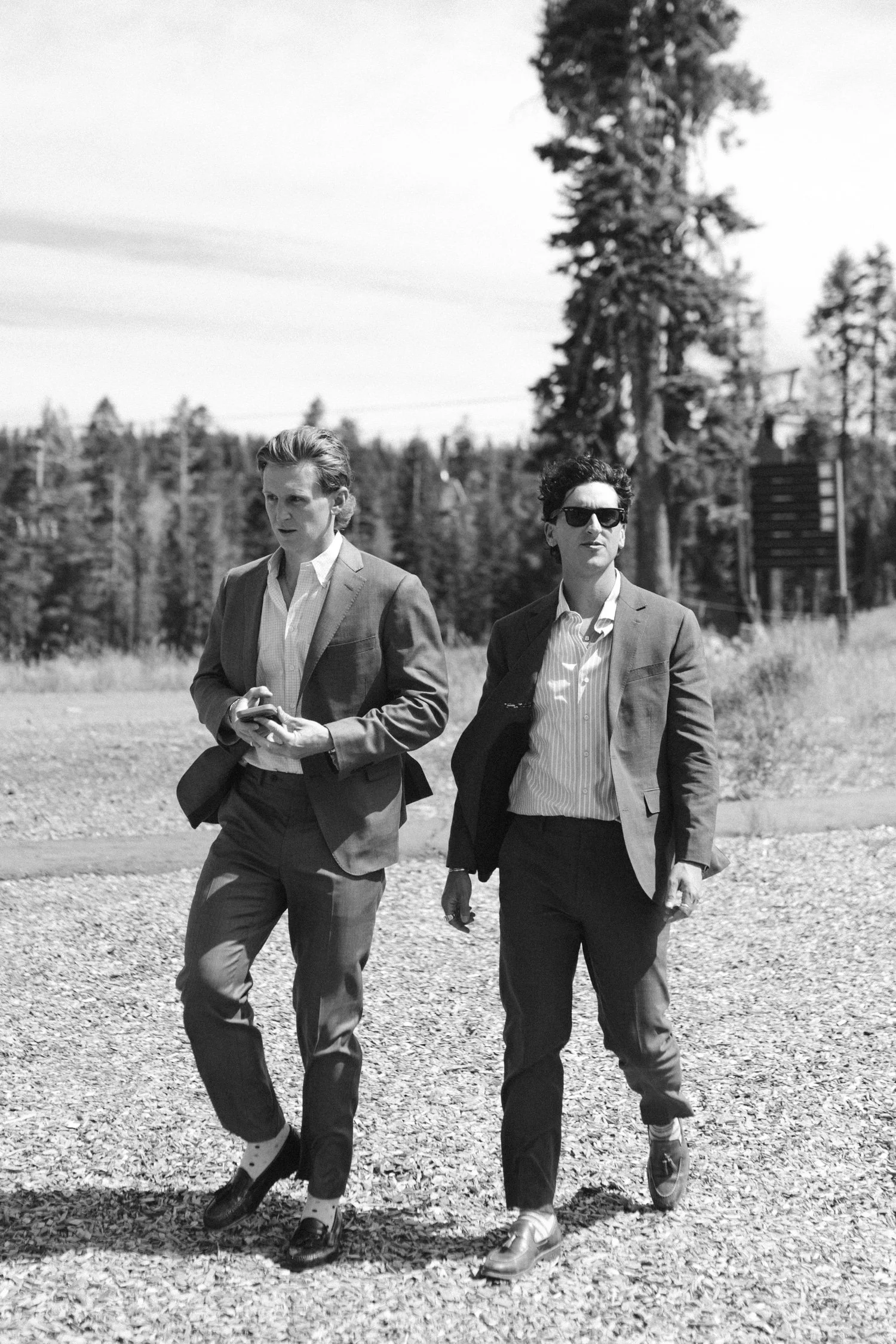 Zephyr Lodge wedding, photo of wedding guests wearing tailored suits