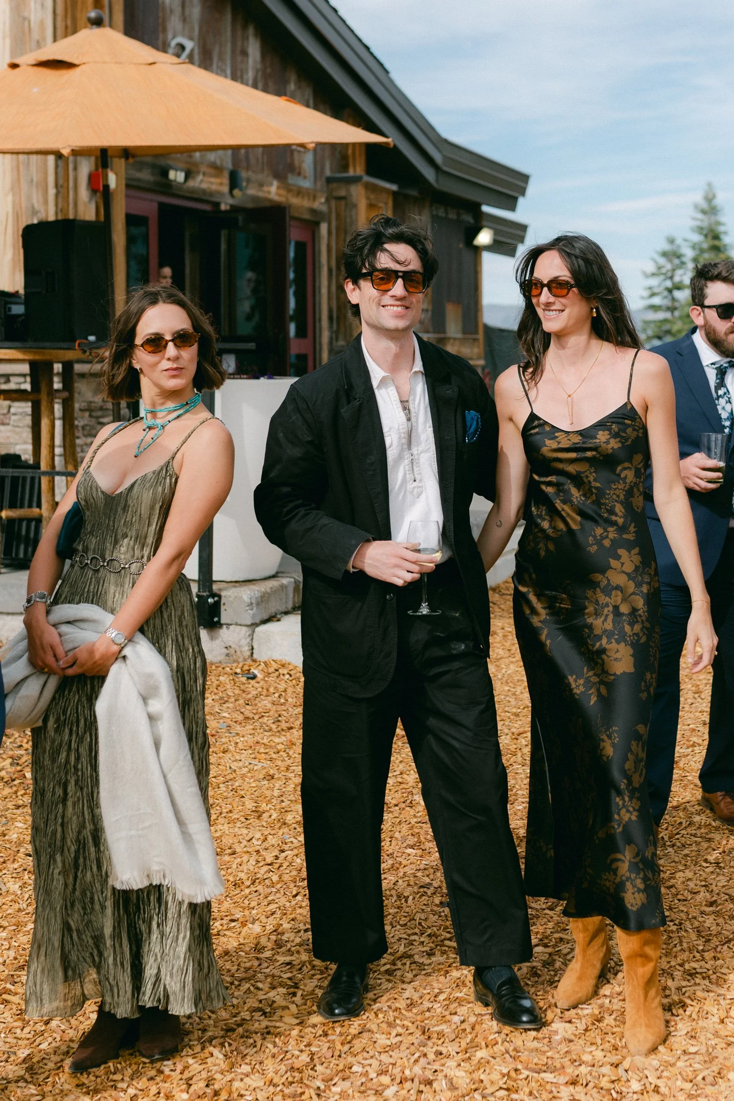 Zephyr Lodge wedding, photo of stylish wedding guests in a Mountain Chic themed wedding attires