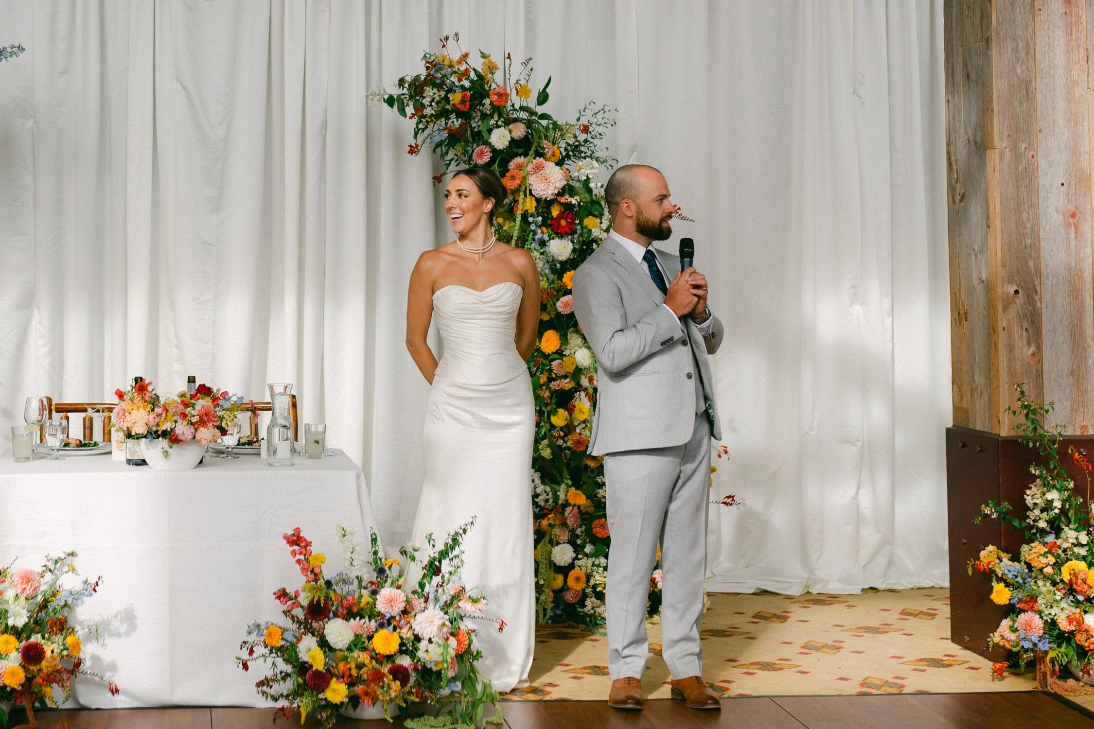 Zephyr Lodge wedding, photo of the newlywed couple giving speeches during the wedding reception