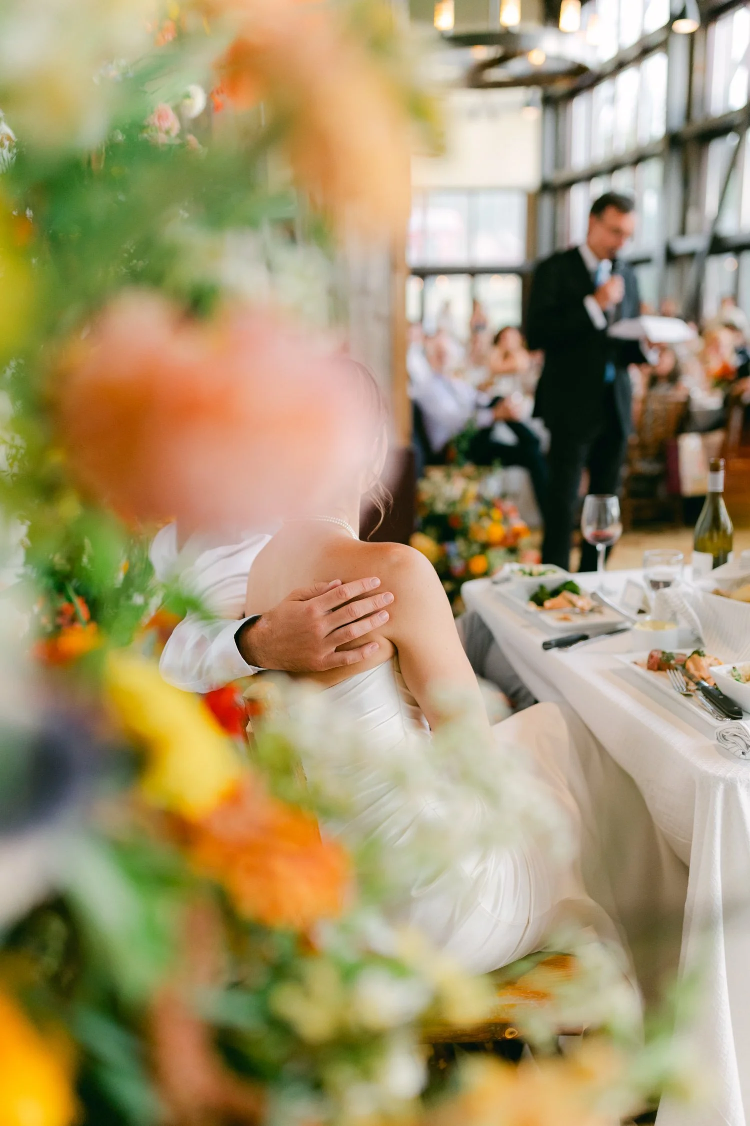 Zephyr Lodge wedding, photo of heartfelt wedding speeches at a colorful wedding reception