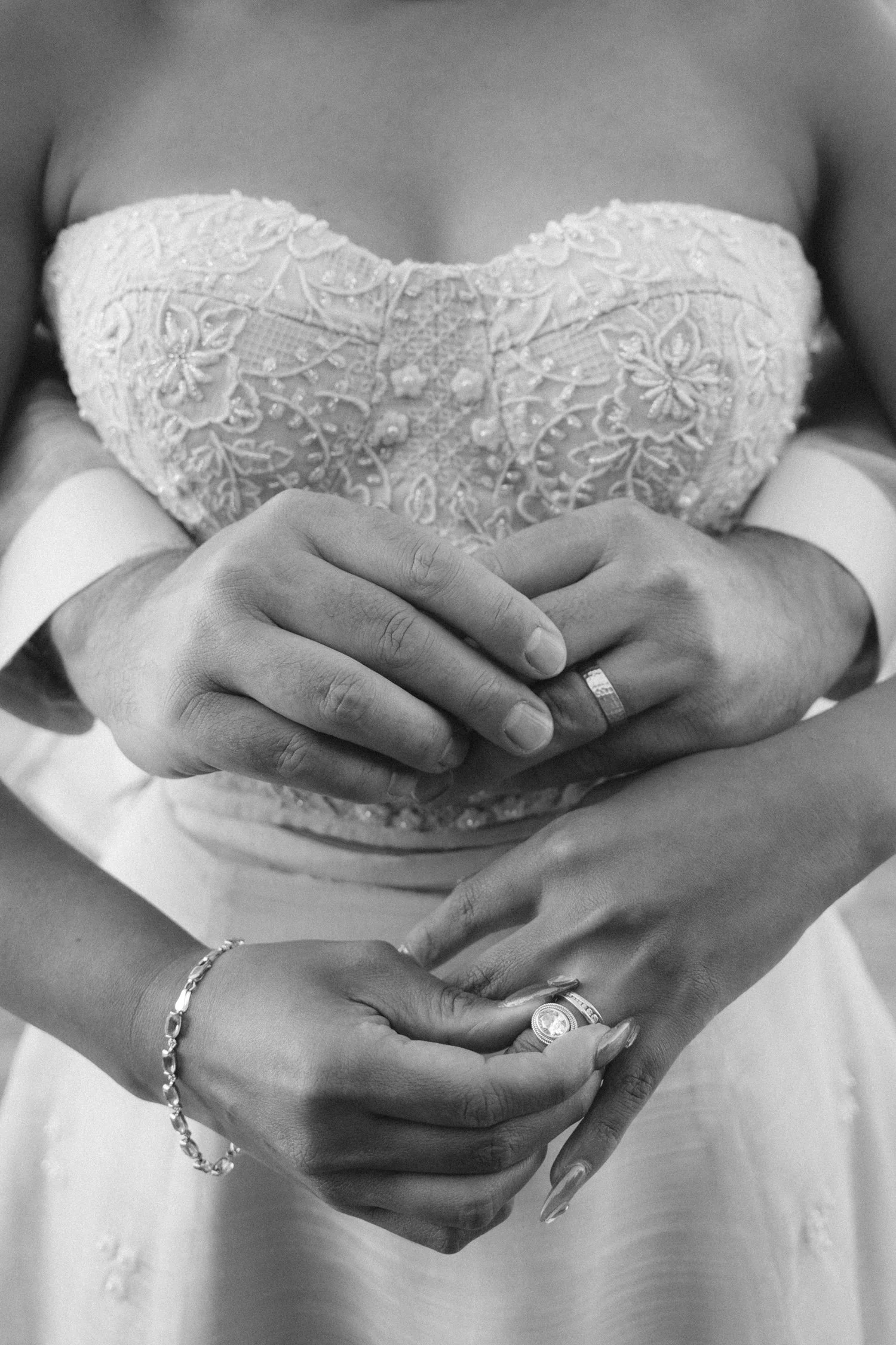 A Valhalla Lake Tahoe Wedding, photo of wedding portrait showing a couple embracing with a focus on their wedding rings