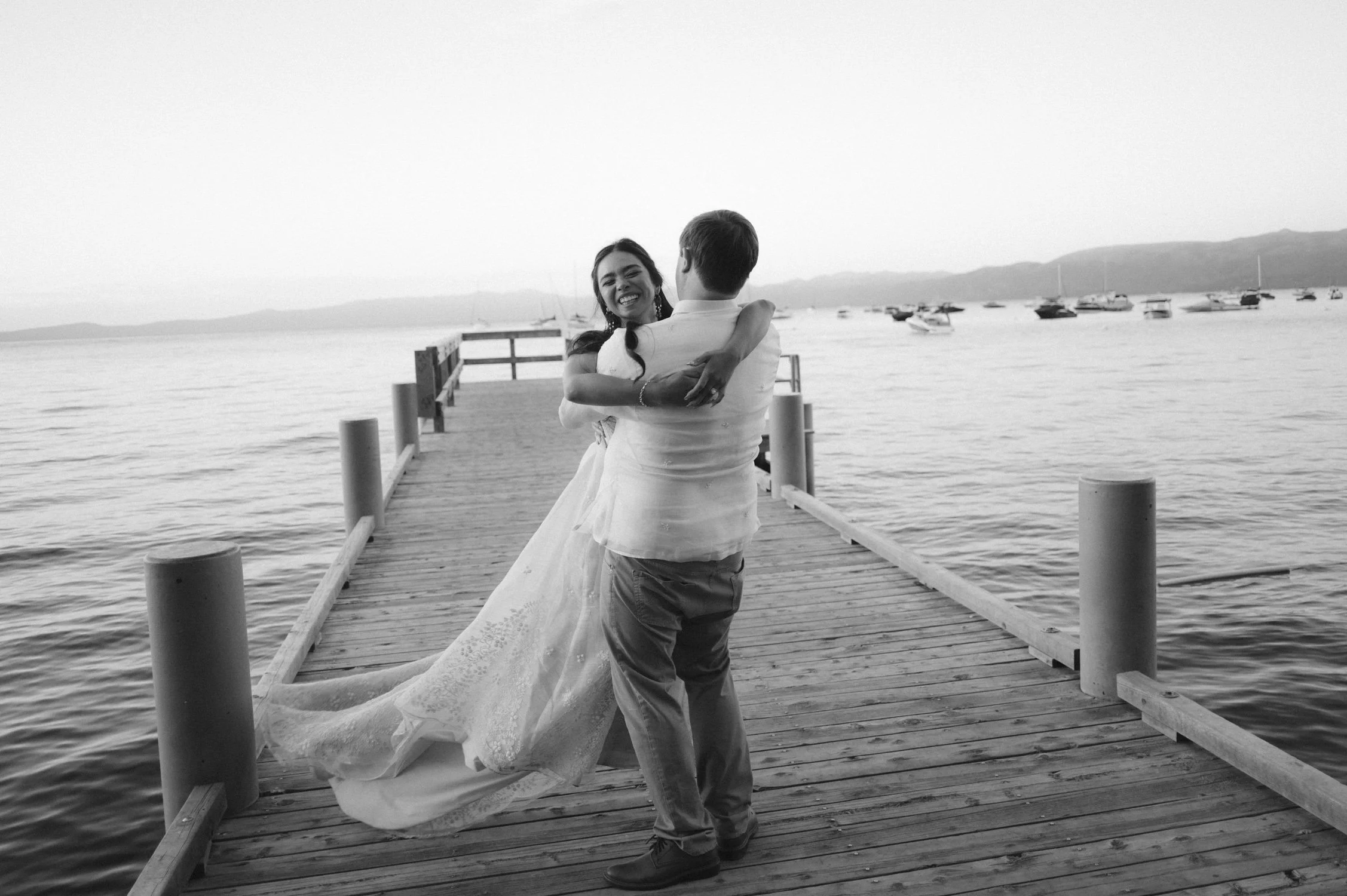 A Valhalla Lake Tahoe Wedding, photo of the couple embracing on a wooden pier