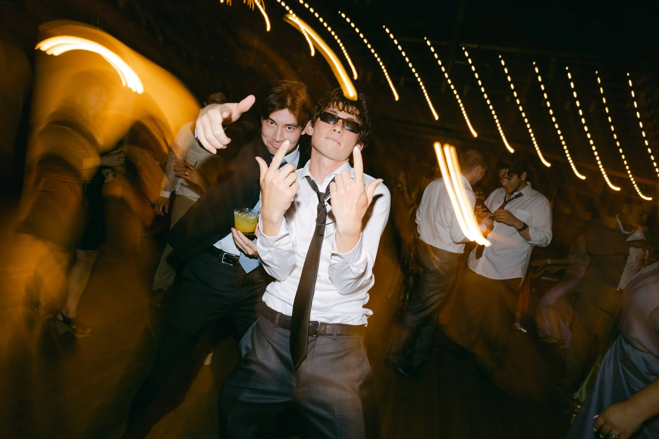 A Valhalla Lake Tahoe Wedding, photo of the wedding guests dancing energetically on a crowded dance floor