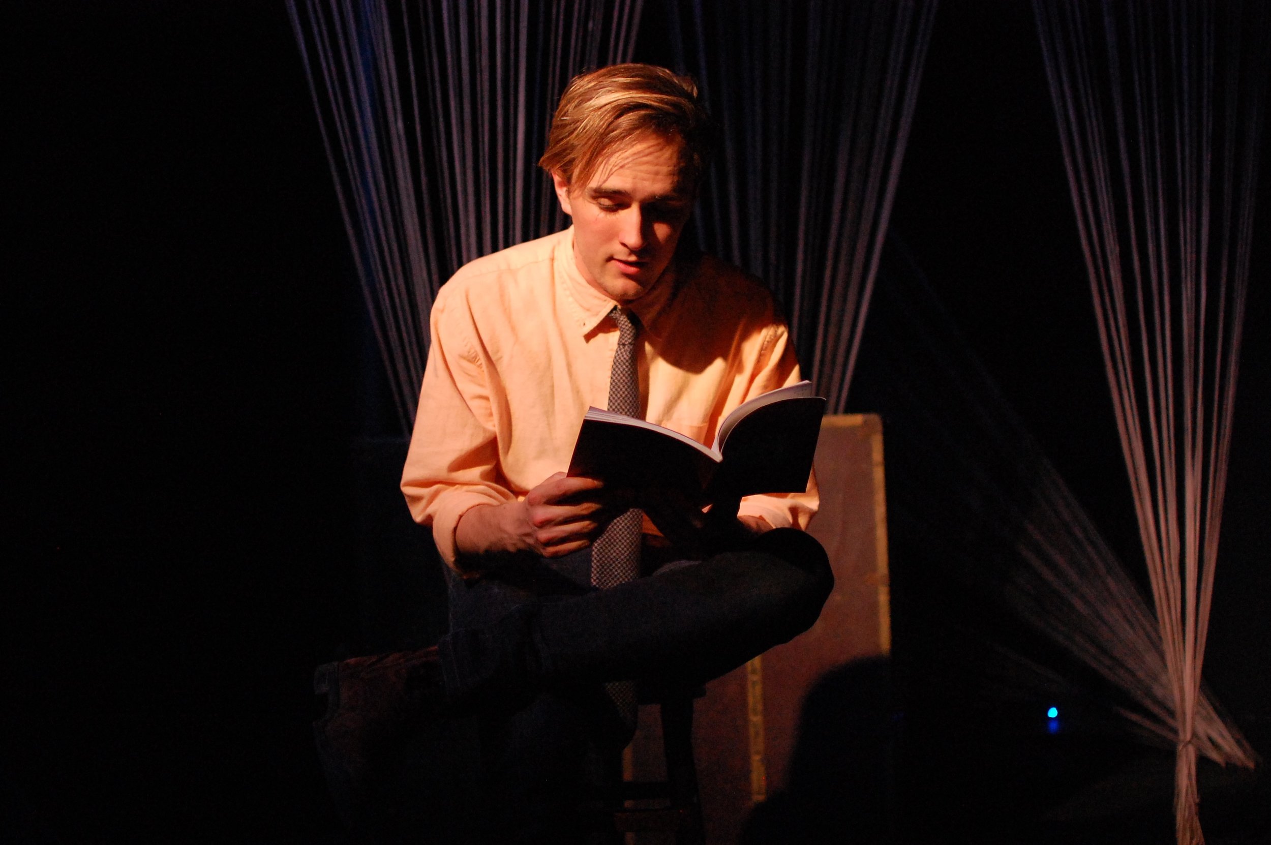 Orpheus reads to his wife while she's in a coma