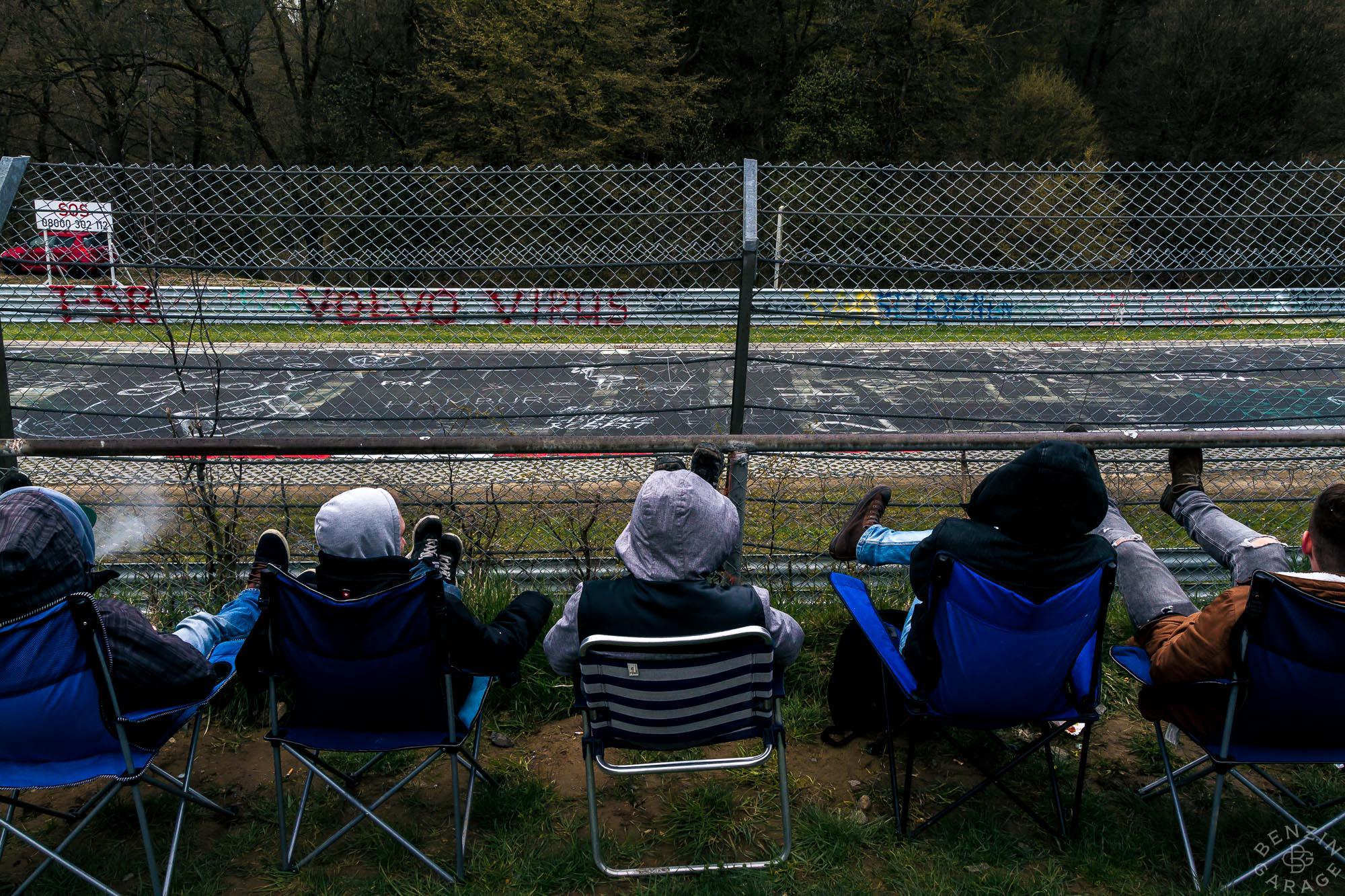 Spectators all along the fencing at the 12-mile Nordschleife dressed to keep warm.