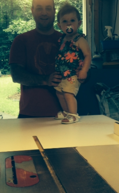 Norah, my sweet little niece, giving some best practice advice on how to use the table saw.