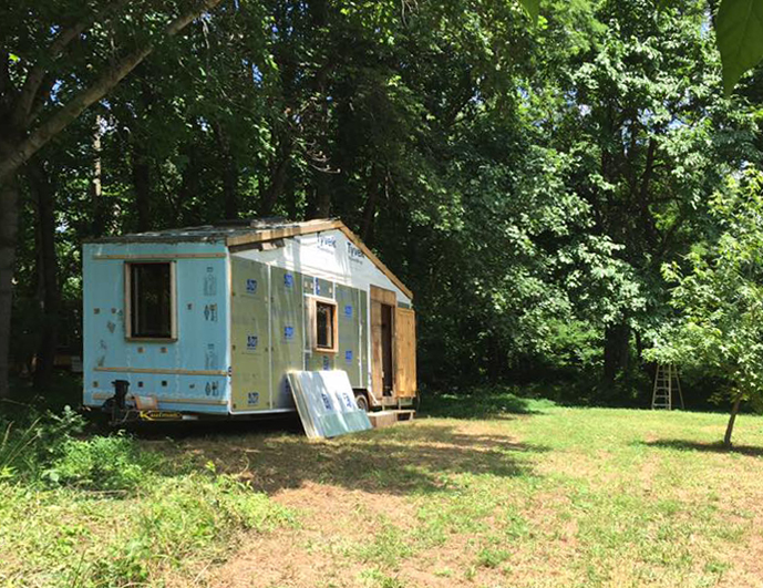 The tiny has landed in its forever home. It has a lovely view of a burgeoning garden and chicken coop to the front, and it's soulmate tiny house in the woods to the back. above above: a short video of the move I thought best expressed in this painting by an artist that I can't accurately cite - my apologies artist. I love it! 