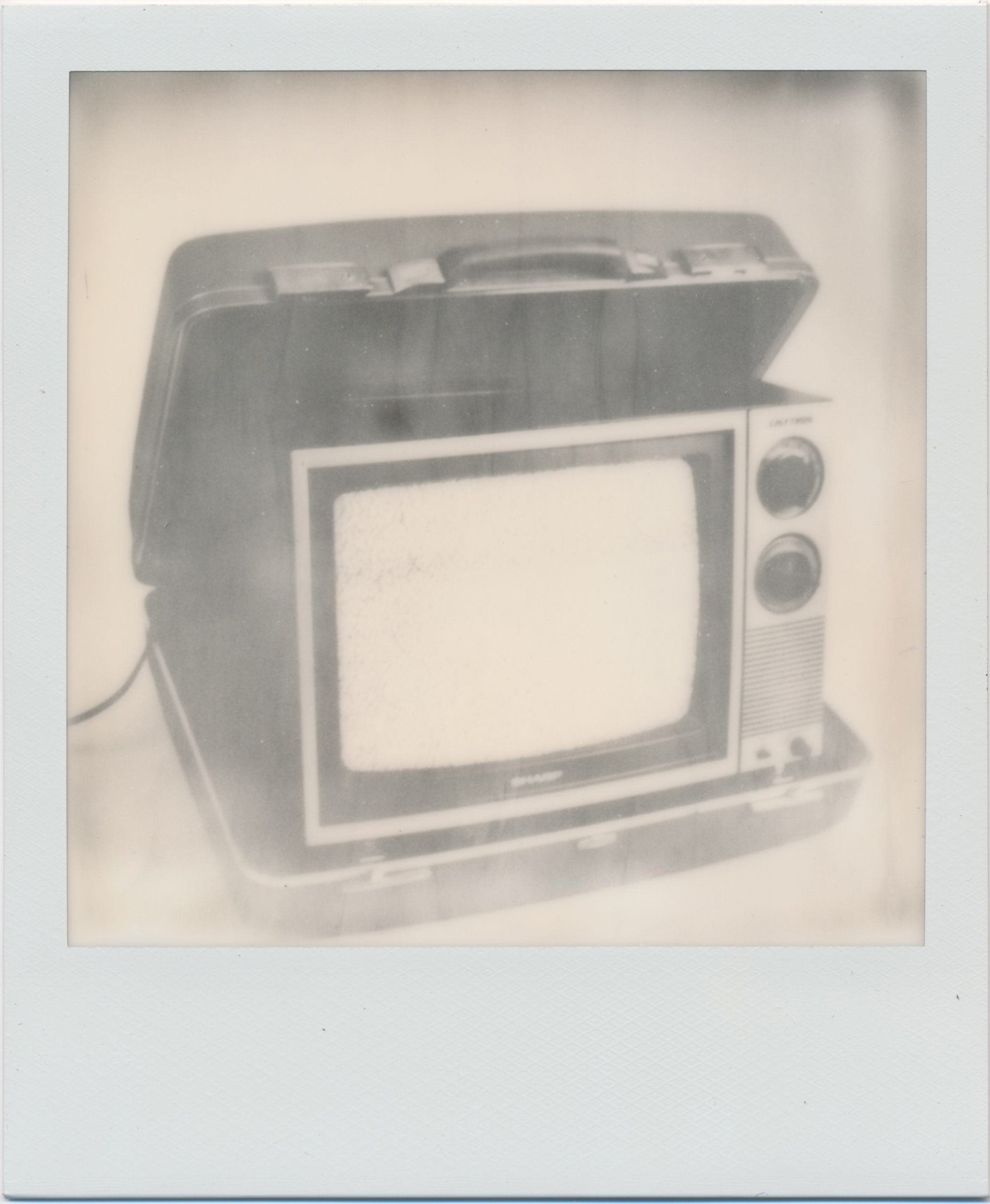   Port-a-Tube   2015  Impossible Project SX-70 Silver Shade 