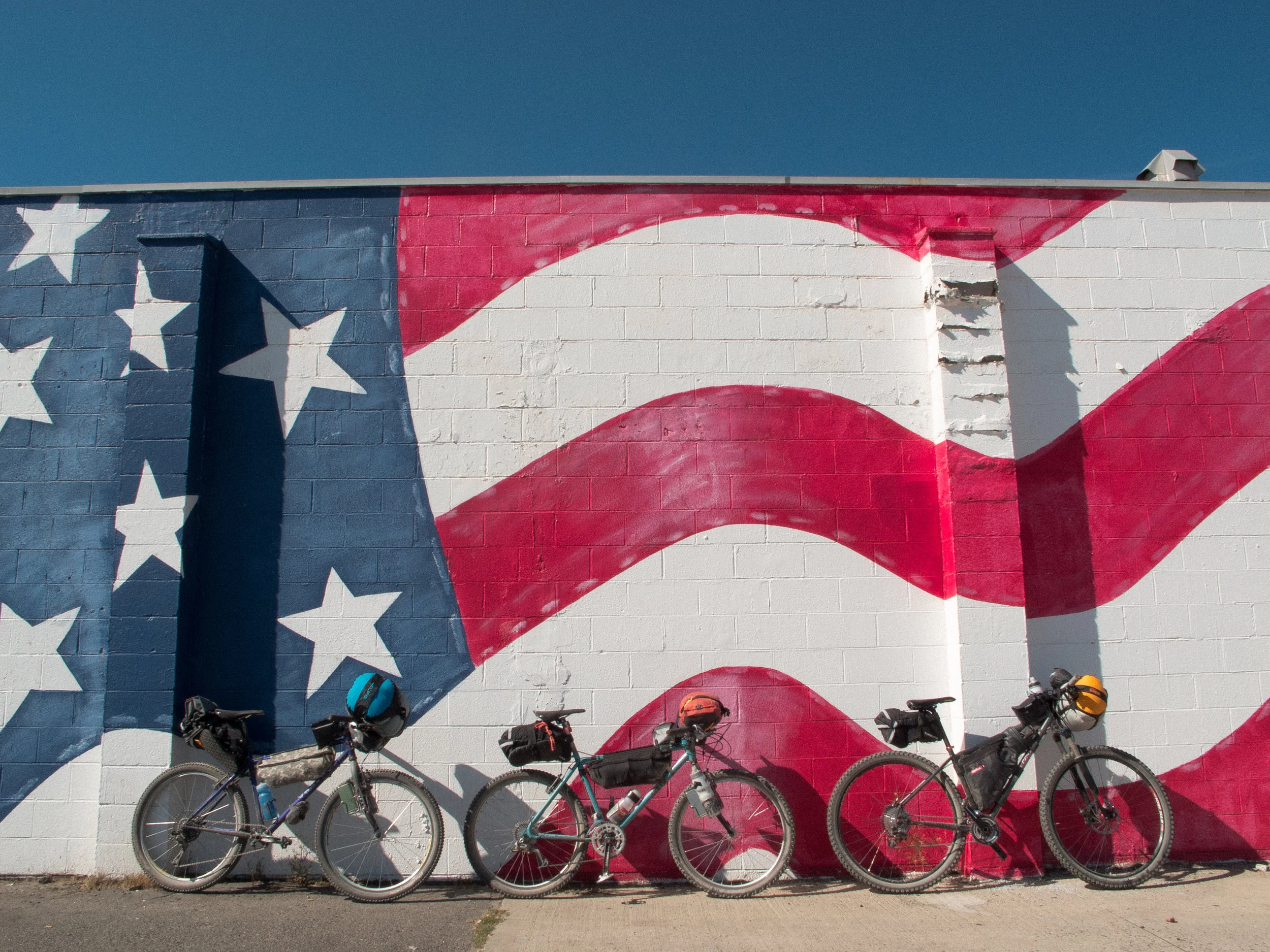 a wall near the grocery where we re-fueled. we ran into another hot springs looper riding a recumbent fat bike