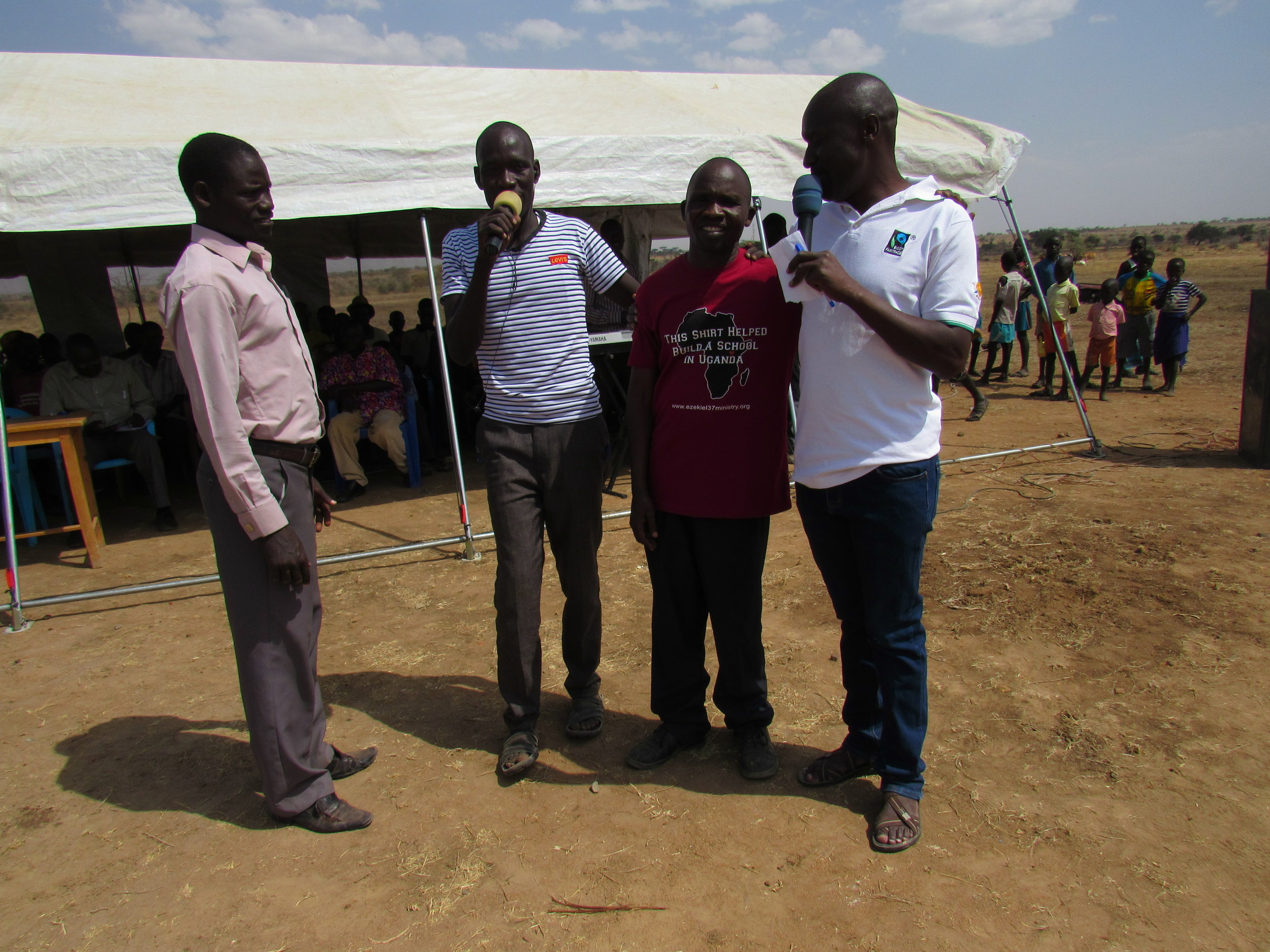 The Masters of Ceremony introducing Pastor Philip (the one in the Ezekiel 37 shirt).