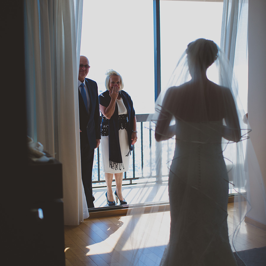 One of a set of images taken at this chic destination Wedding of Jenna & Nick. The stylish old town of Dubrovnik, Croatia.  Parents of the Bride look on proud.  Photography by Matt Porteous