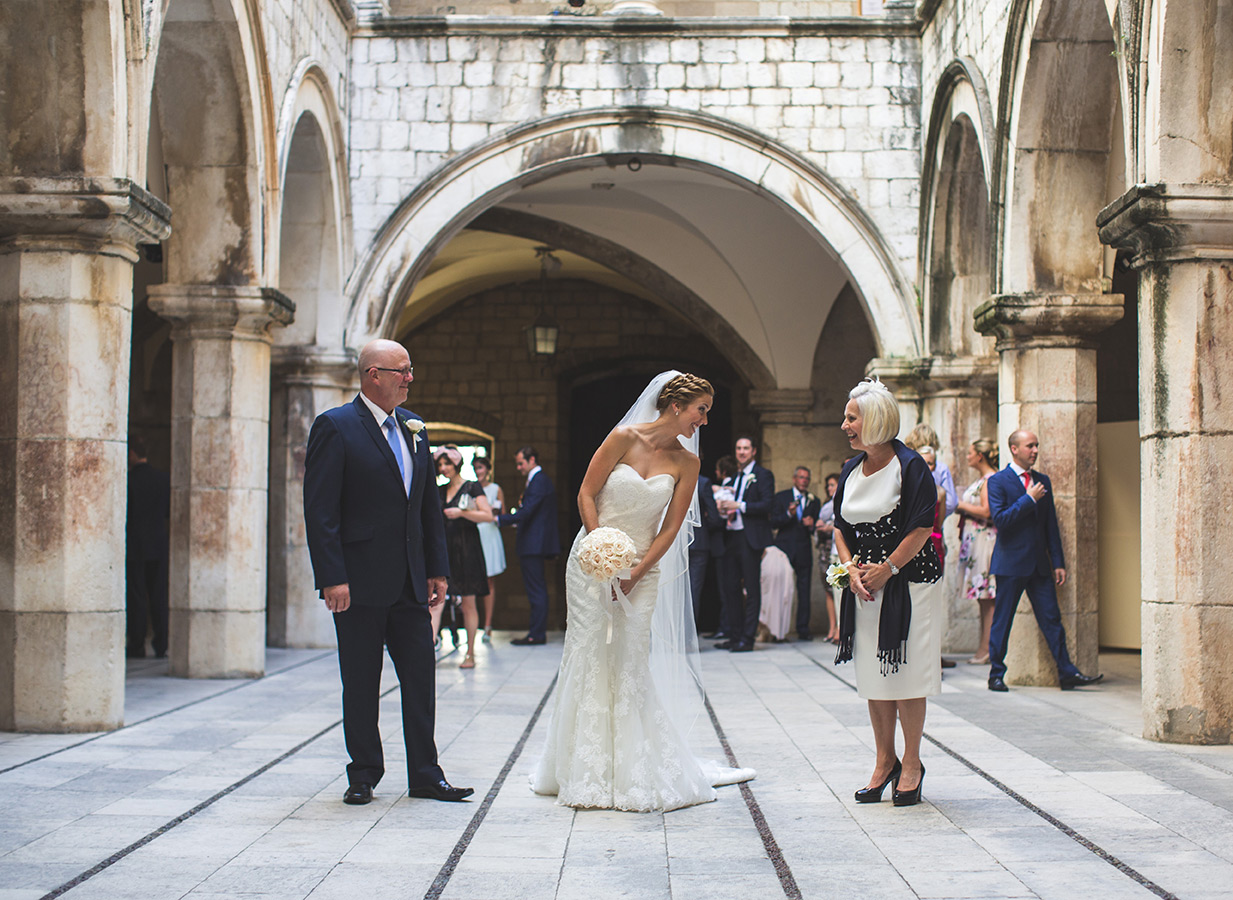 One of a set of images taken at this chic destination Wedding of Jenna & Nick. The stylish old town of Dubrovnik, Croatia.  The Bride awaits.  Photography by Matt Porteous