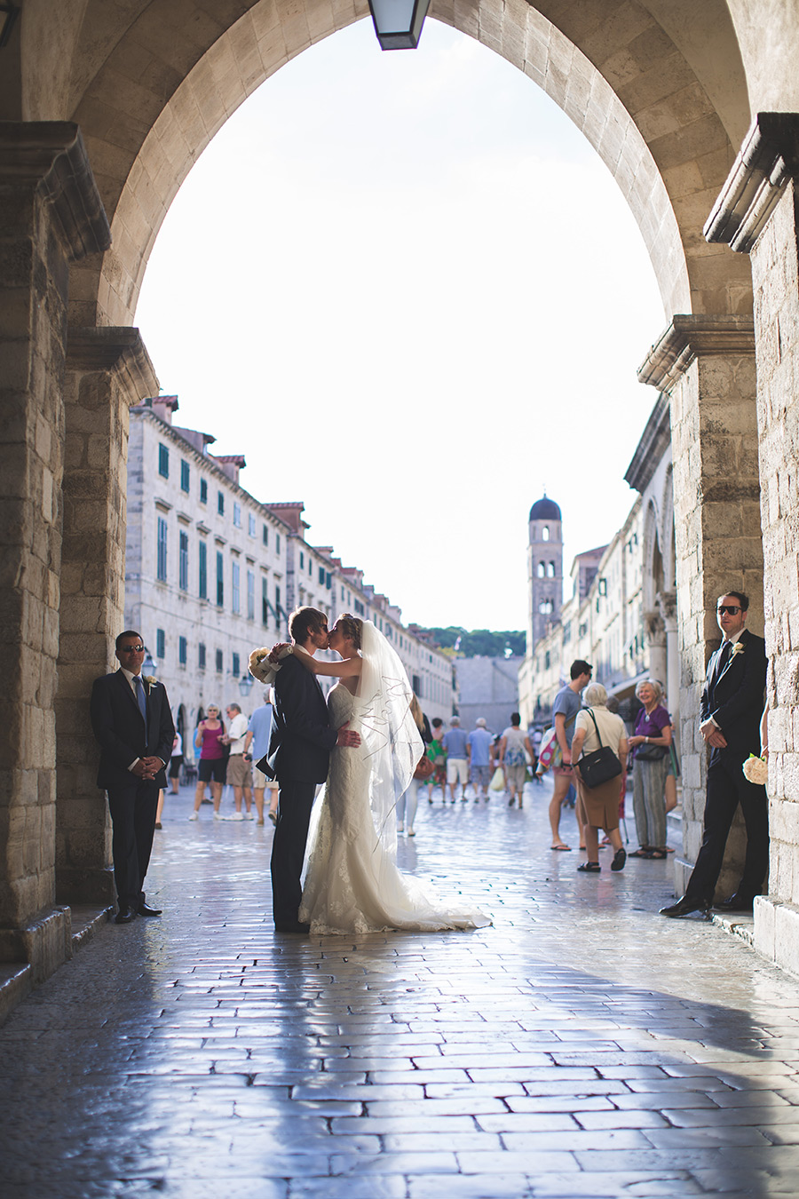 One of a set of images taken at this chic destination Wedding of Jenna & Nick. The stylish old town of Dubrovnik, Croatia.  The couple share a kiss.  Photography by Matt Porteous