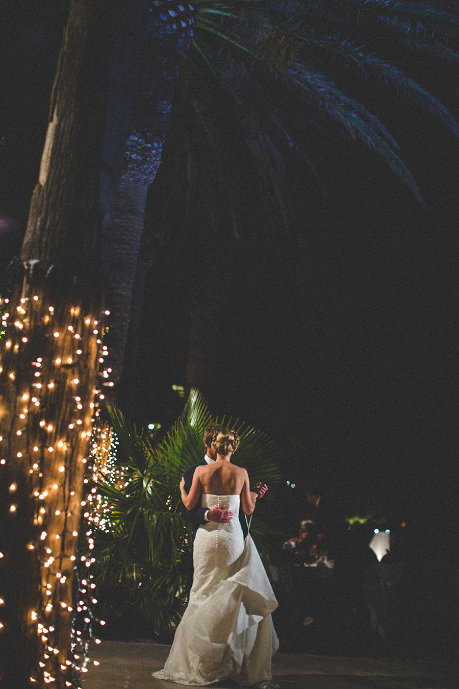 One of a set of images taken at this chic destination Wedding of Jenna & Nick. The stylish old town of Dubrovnik, Croatia.  The couple dance underneath the night sky.  Photography by Matt Porteous