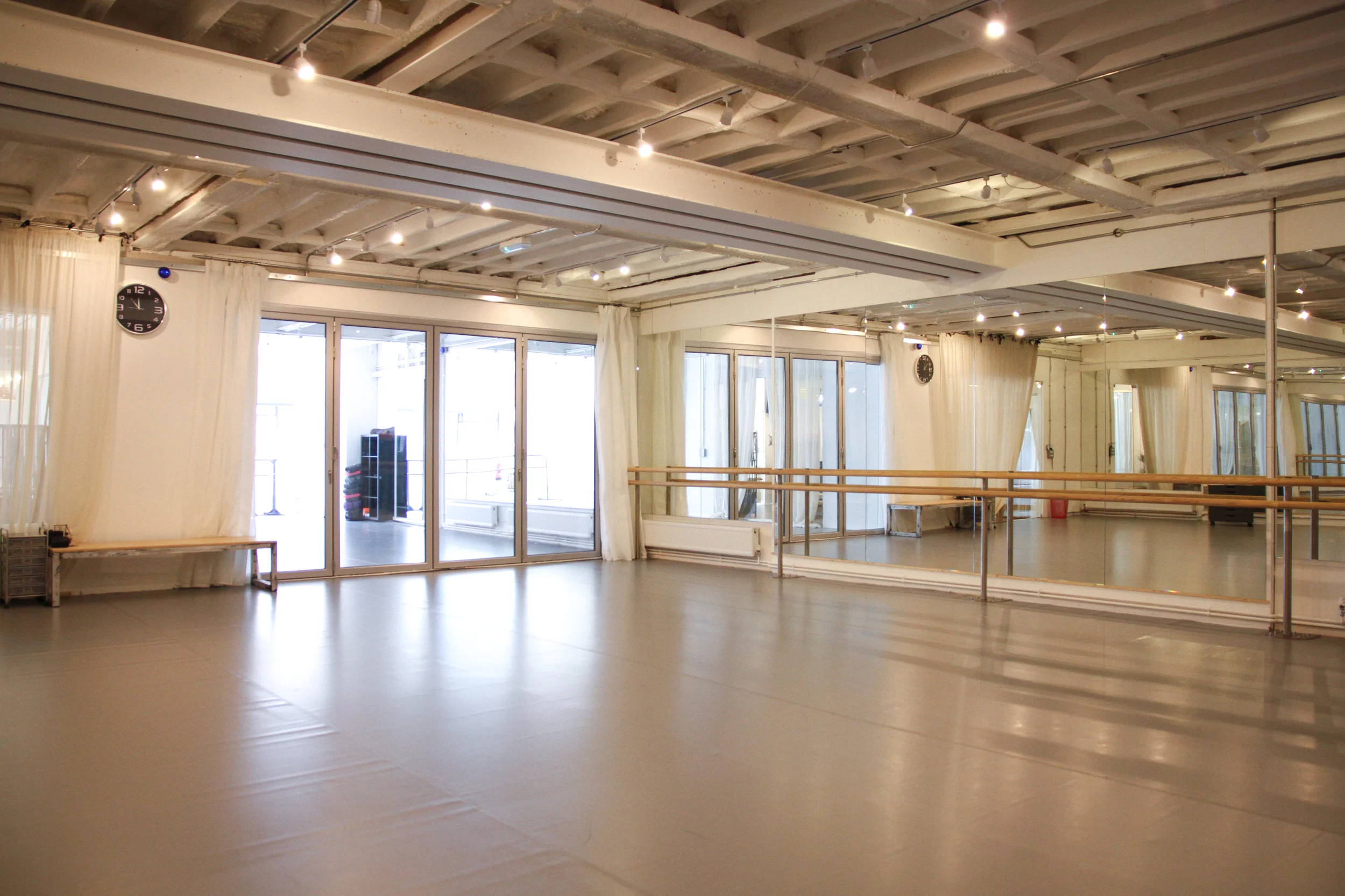 Our gorgeous Large studio looking through glass partition doors into the second studio space.