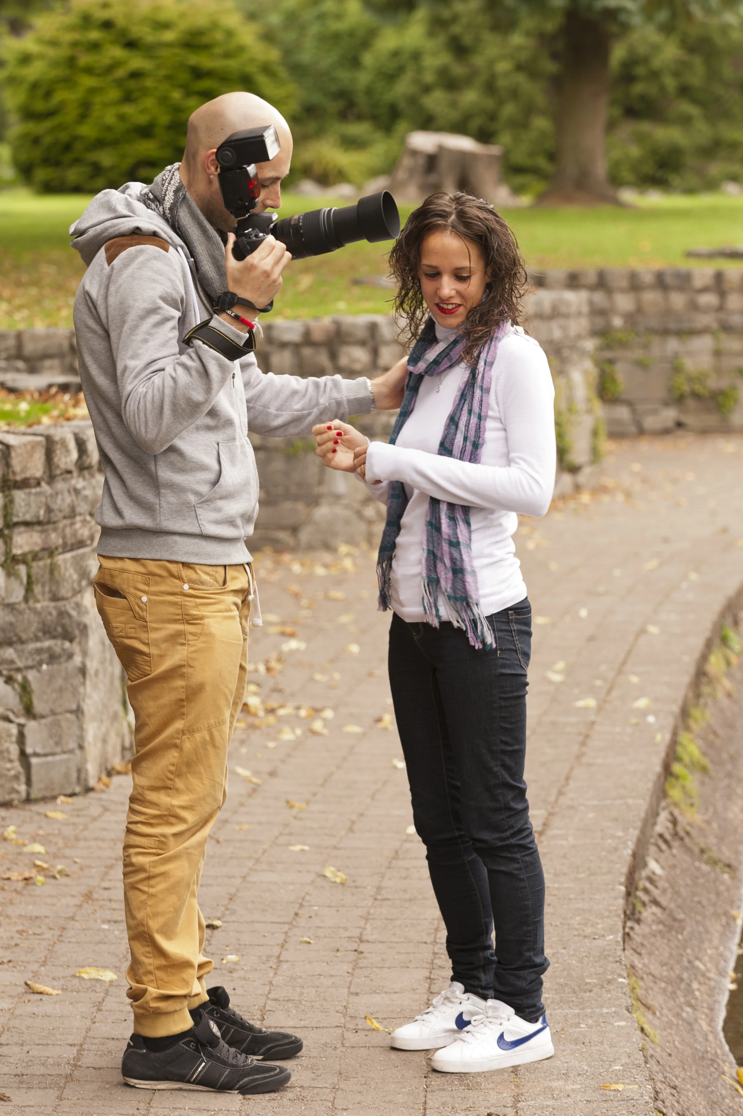A student directs a model during a tuition session.