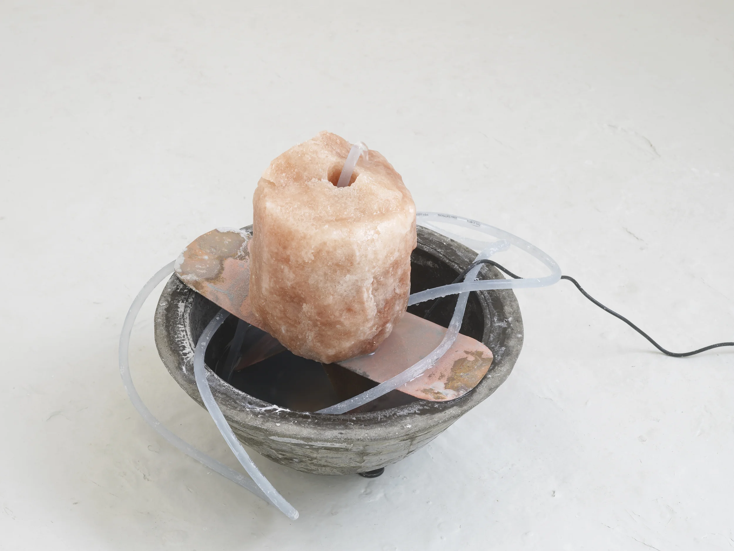    Solve et Coagula ,  copper,&nbsp;aluminous cement, Himalayan salt rock, water, pump, 2016  (Photo by Andy Keate) 