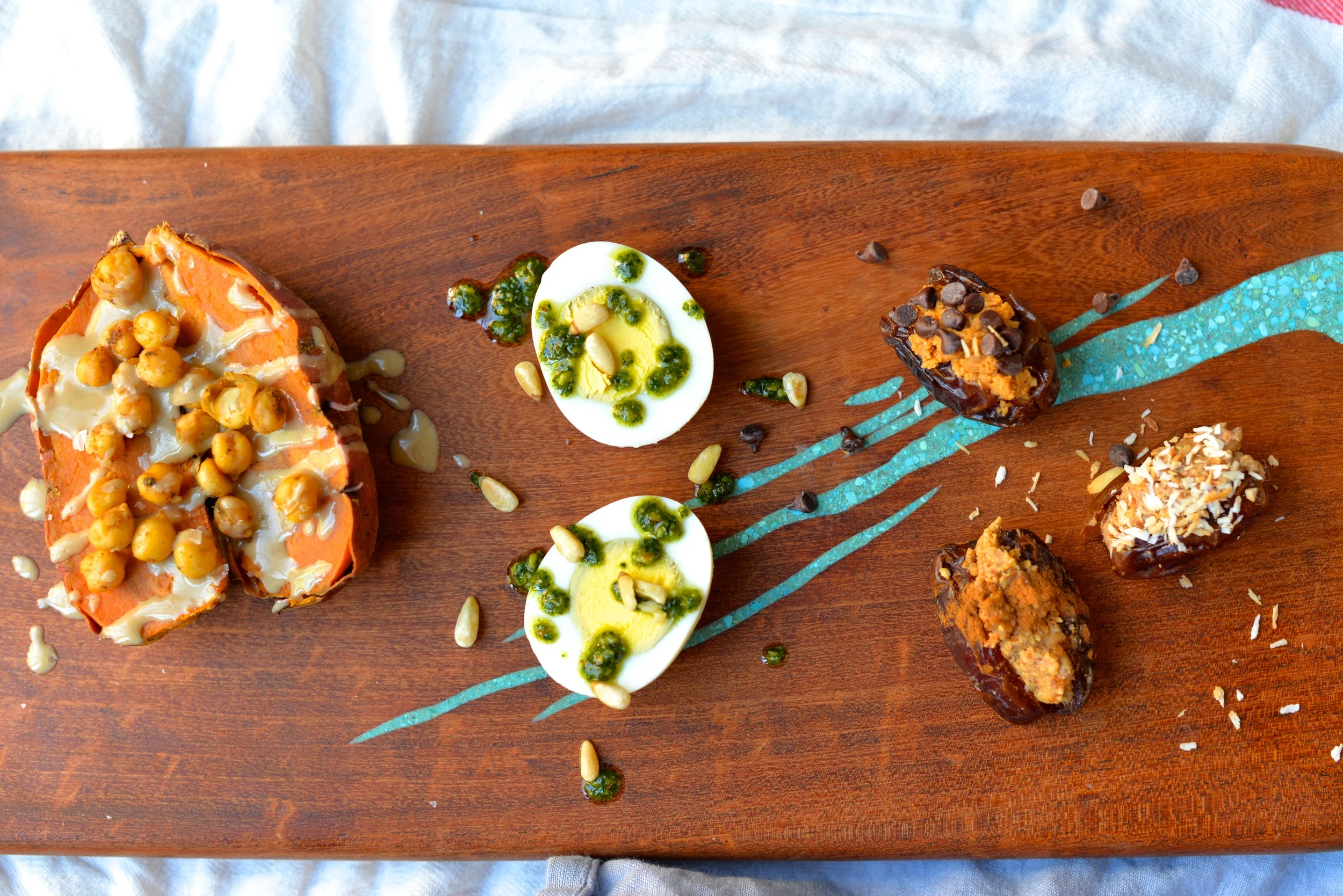 Roasted Sweet Potato with Tahini, Za'atar Roasted Chickpeas, and Sea Salt|| Hard-boiled Egg with Kale and Basil Pesto and Pinenuts|| Stuffed Dates with Toasted Coconut and Almond Butter, Peanut Butter and Chocolate Chips, and Almond Butter with Cinnamon
