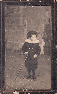 "Portrait of a young boy holding a walking stick/cane (undated)" from pellethepoet. Via Flickr . I searched Flickr for "fashion walking stick" and this was the second result. Hahahahahaaaa