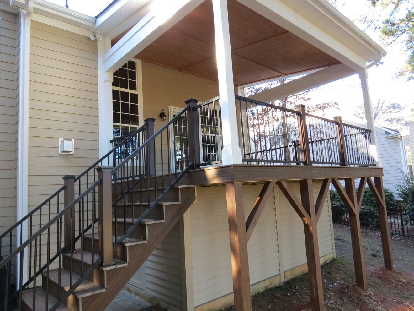 Second Story Trex Deck With Stone Patio Deckscapes Second Story Trex Deck With Stone Patio Deckscapes