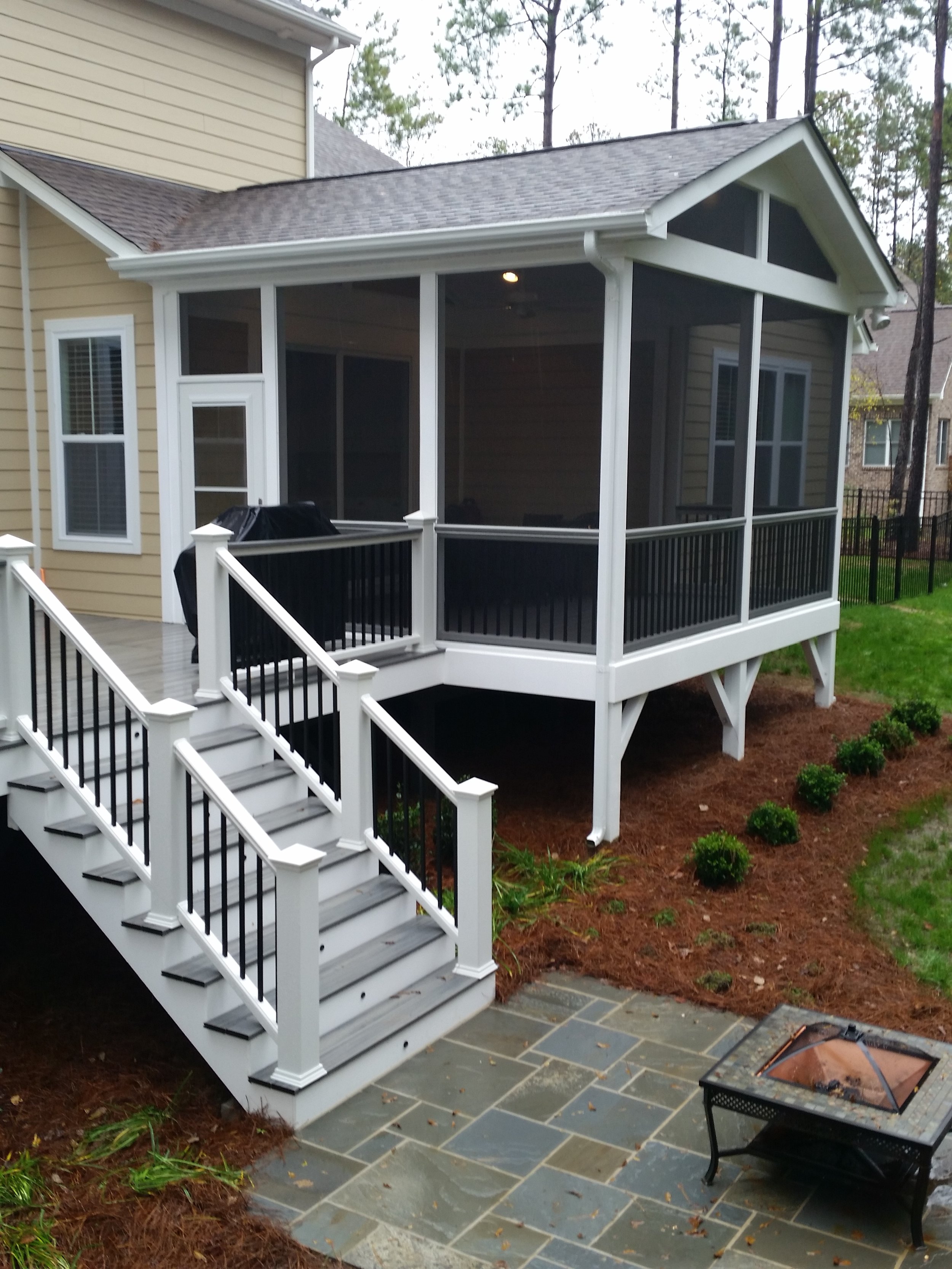 Classic Screened Porch With Trex Deck And Bluestone Patio — Deckscapes