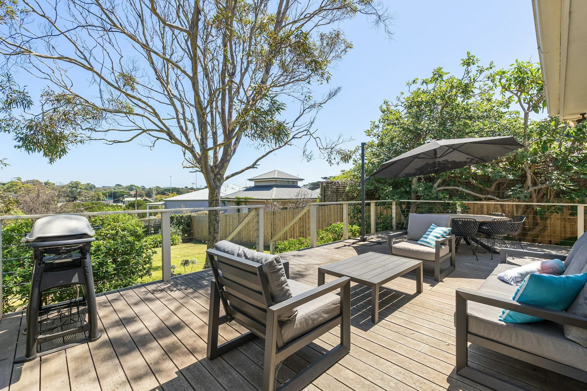 How a Deck Design Contractor in Charlotte Approaches Sloped Yards