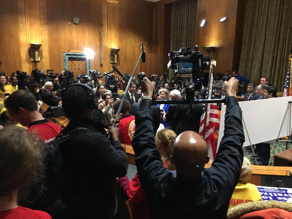 Tim Wilson on the scene in DC at the Hands Off Medicare press conference last week.