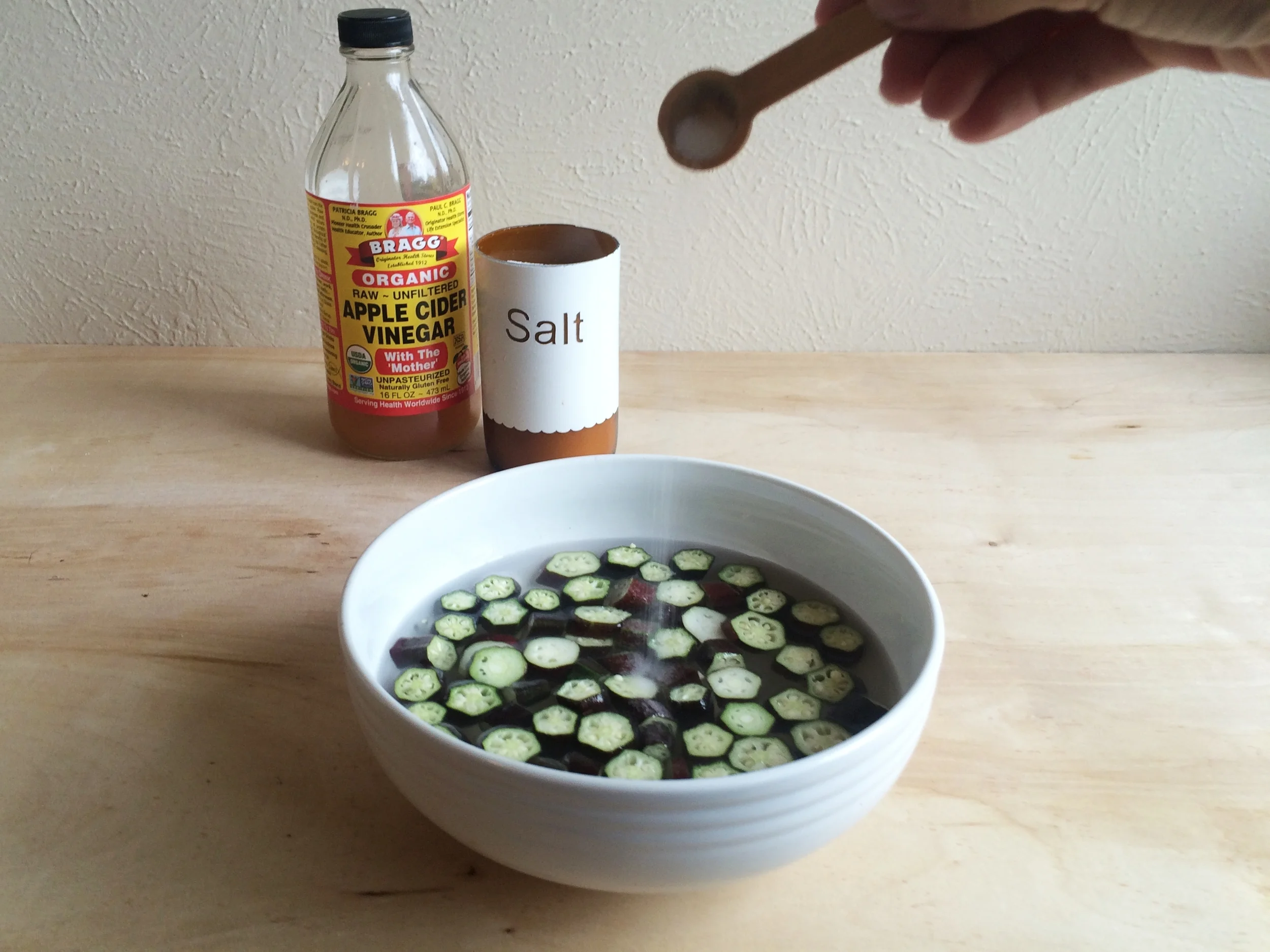 I got a head of myself and cut the okra before remembering the suggestion was to soak the pods whole. oops.