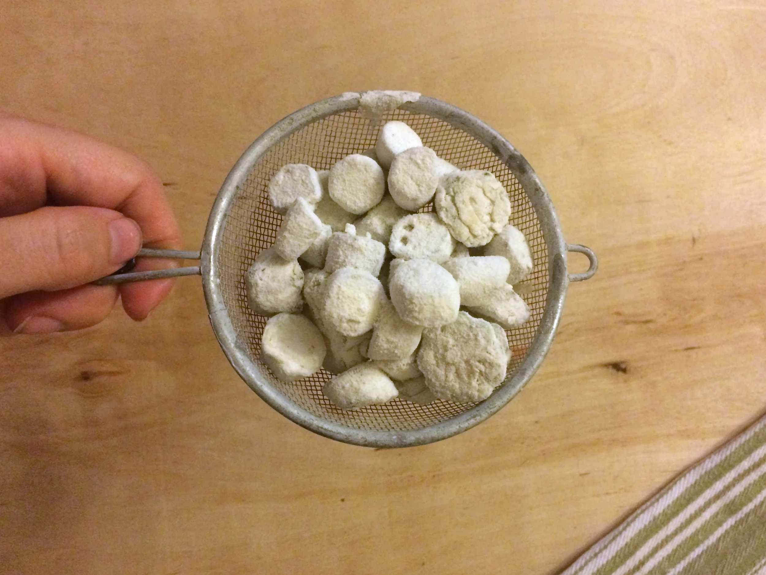 I had heard people say that coating the okra in flour and frying it would help to absorb the gooeyness. I thought this was a perfect batch to try that. This tiny mesh strainer is one of my favorite kitchen tools. It was a great way to make sure the okra was well coated in flour but there wasn't excess going into the oil.