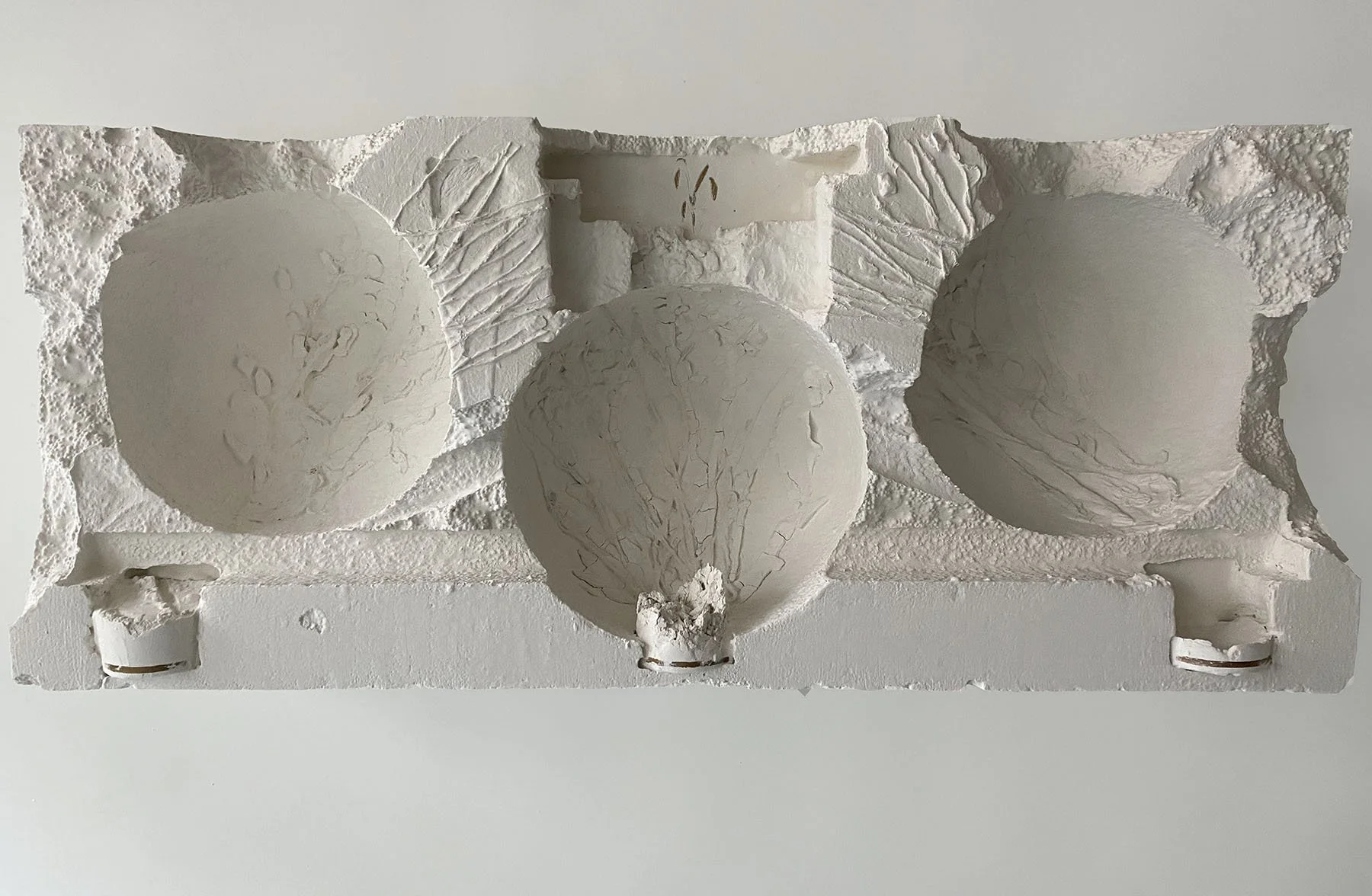 Altarpiece, 2025, Plaster, acrylic paint, burlap, recycled styrofoam, oil paint, 18 x 43 x 10 inches