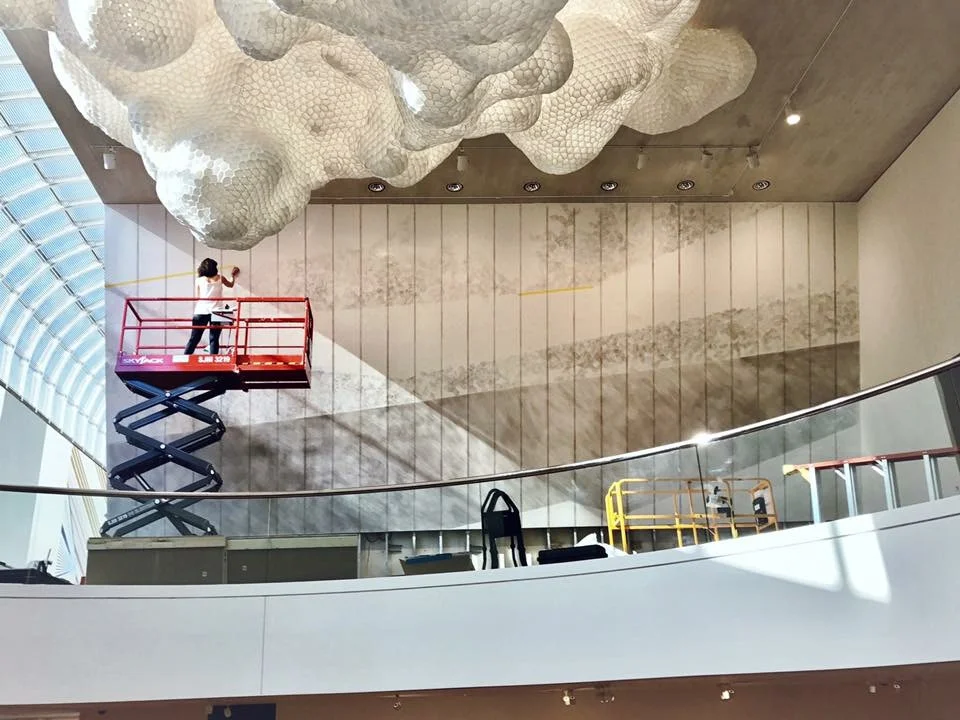 Daniela Rivera installing mural 
