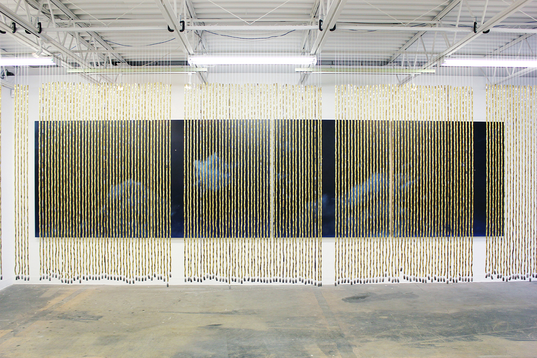 Shooting Skies, 2014 Daniela Rivera’s interest in the accidents which can occur while painting began early in her career. The notion of trauma and its unforeseeable quality have been present in her work since the post dictatorship period in Chile, where she graduated from the Art School in Santiago in 1996. The move to the United States allowed Daniela to move beyond those first years of practice and concentrate not only on the narrative aspects of the work and her personal history, but on the over arching concepts behind the work. Rather than telling stories through images, she became interested in materializing concepts in her work. The notion of trauma, its unpredictability, its lack of context and its aggressively transformative power became the focus of her formal explorations. In 2009, Daniela started working on a series of paintings titled Accidental Skies. She began by splashing or dropping different liquids over carefully prepared and painted surfaces. Her intention was to introduce chance over the deliberate and to abandon total control over the outcome and final product. The accident happened to the image without any warning, not allowing it to anticipate or adjust to the changes that came with this aggressive attack. The encounter with the reality of the physicality of the painting appeared as a perfect allegory for psychological trauma. All artifice or illusion proposed by the image collapses confronted with the spill of liquid sitting on top of the surface destroying any allusion to space or three dimensionality. Furthering this idea, this new series titled Shooting Skies is a commentary on the seductive and traumatic aspects of violence. By inserting the work into the discursive space of gun policies and politics in America, Daniela means to address these issues from an LaMontagne Gallery, Press Release