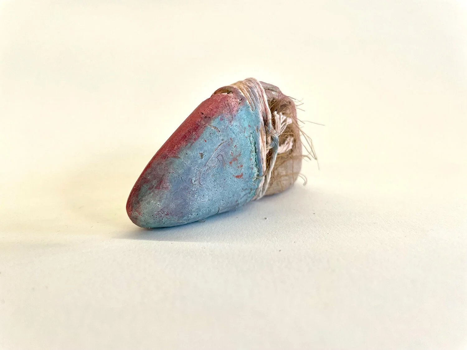  Fresco on wood with string  3.25” x 1.75” x 1” 