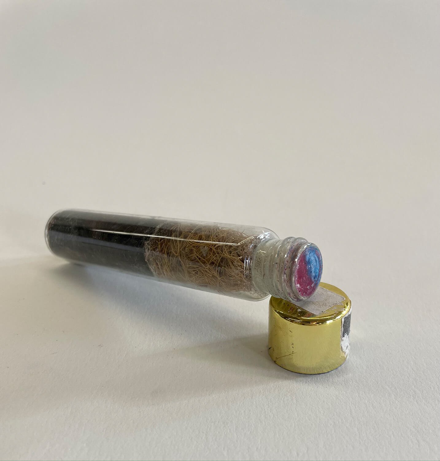  Fresco on bottle with hair and coconut fibers  5” x 1.5” x 0.75”  