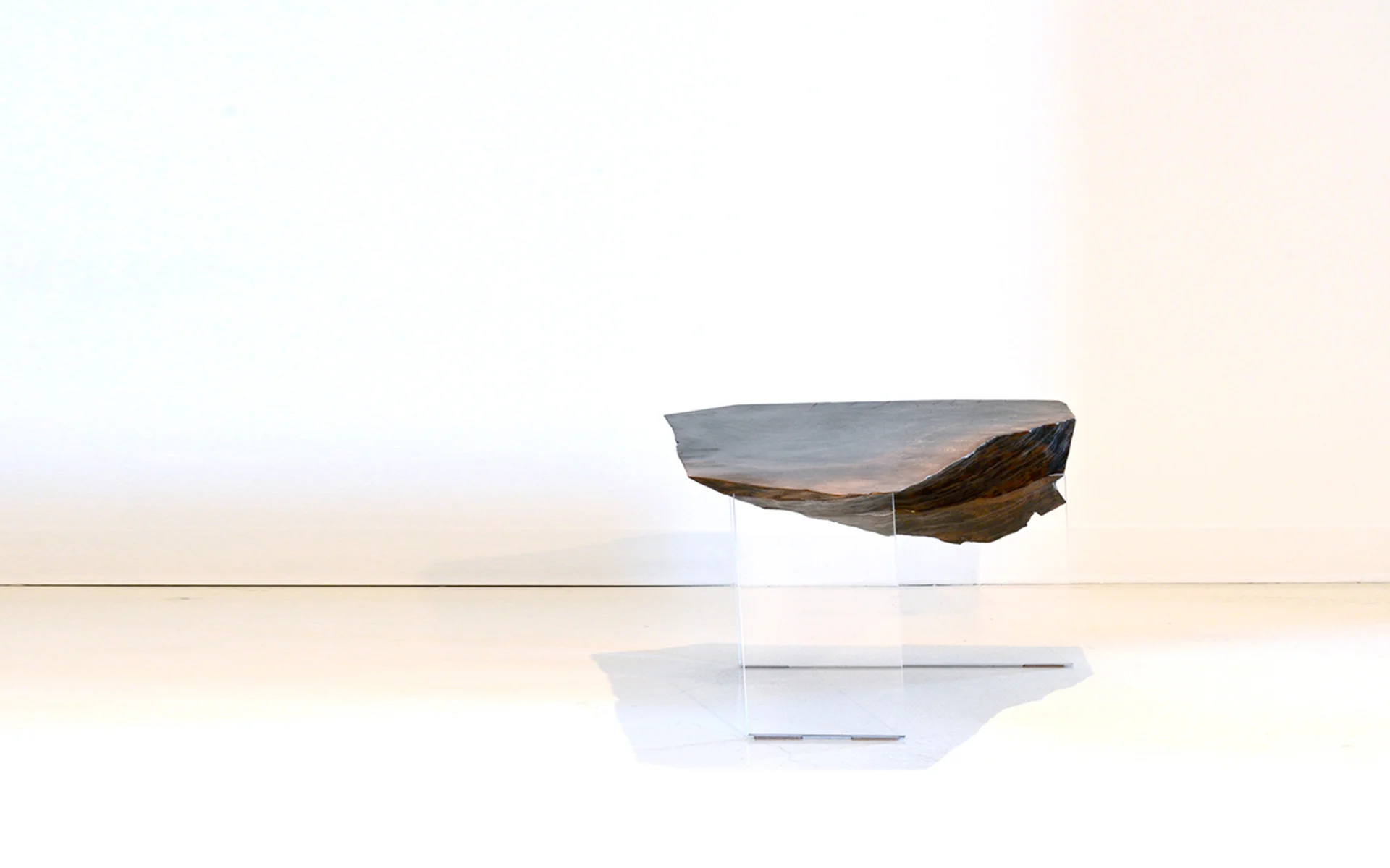 Matthew Metzger furniture; walnut and acrylic floating table